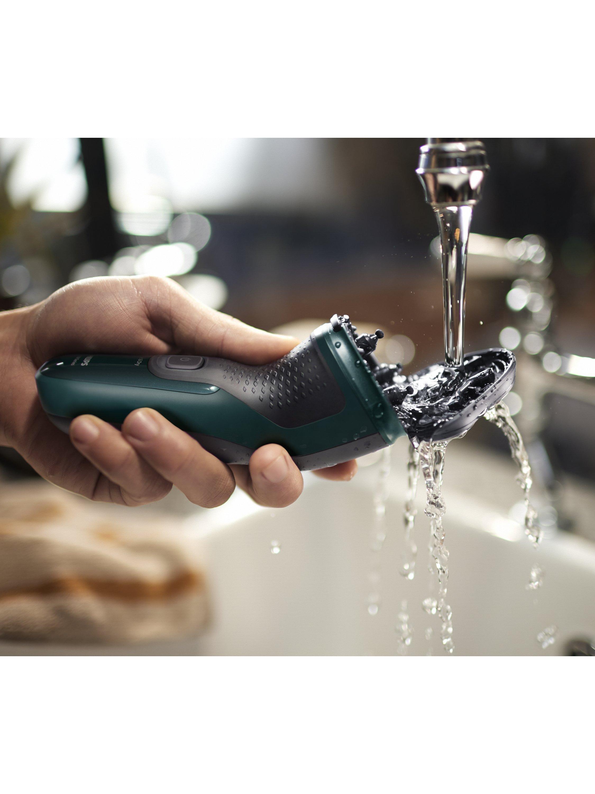 Product image 9 of 12, which shows Philips Series 3000X X3052/00 Wet & Dry Electric Shaver with 27 PowerCut Blades, 4D Flex Heads & Pop-up Trimmer, Dark Green Forest