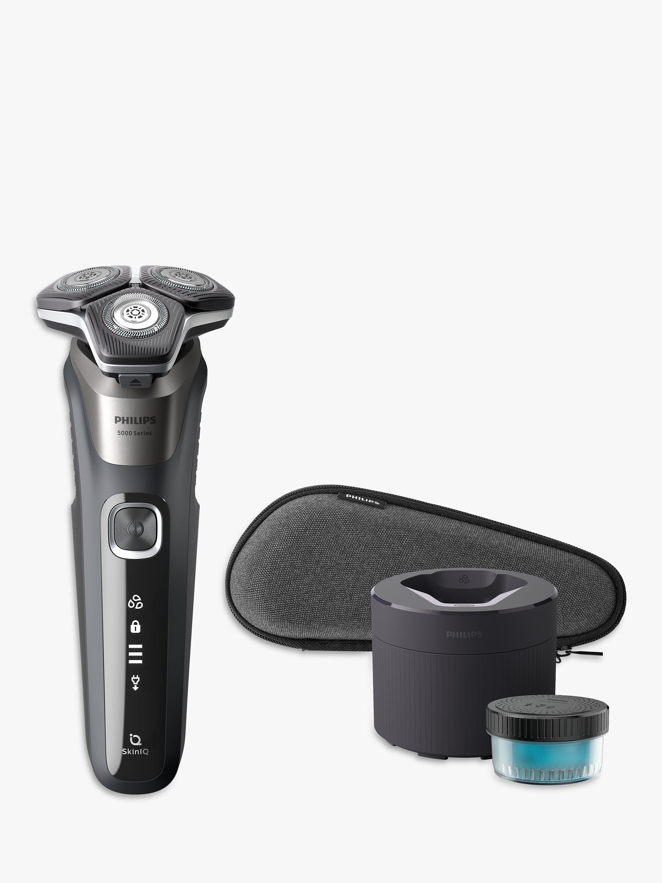 Product image 1 of 12, which shows Philips S5887/50 Series 5000 Wet & Dry Men's Electric Shaver with Pop-up Trimmer, Travel Case, Quick-Clean Pod and Full LED Display, Carbon Grey
