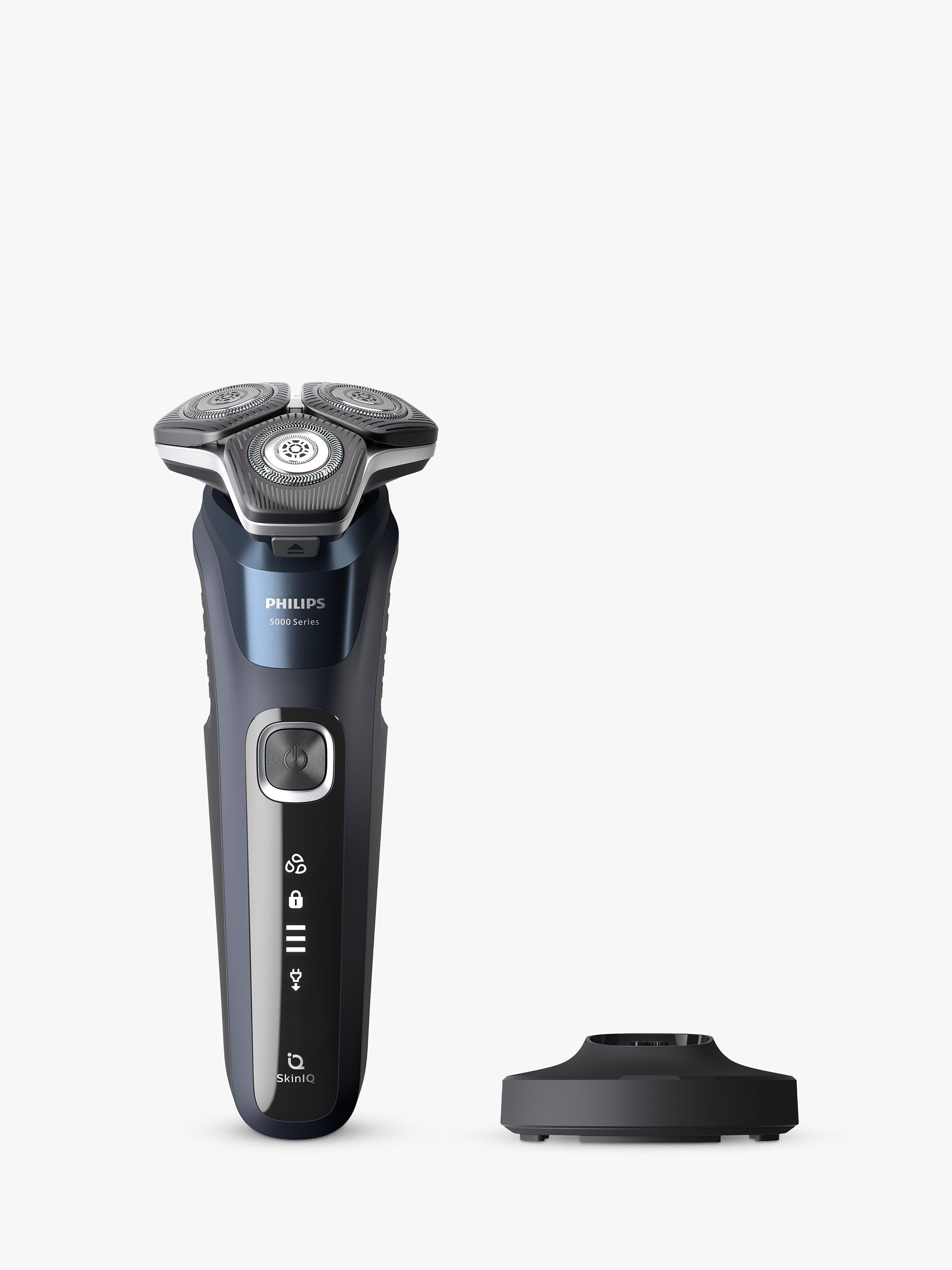Product image 1 of 12, which shows Philips S5885/25 Series 5000 Wet & Dry Men's Electric Shaver with Pop-up Trimmer, Charging Stand and Full LED display, Midnight Blue