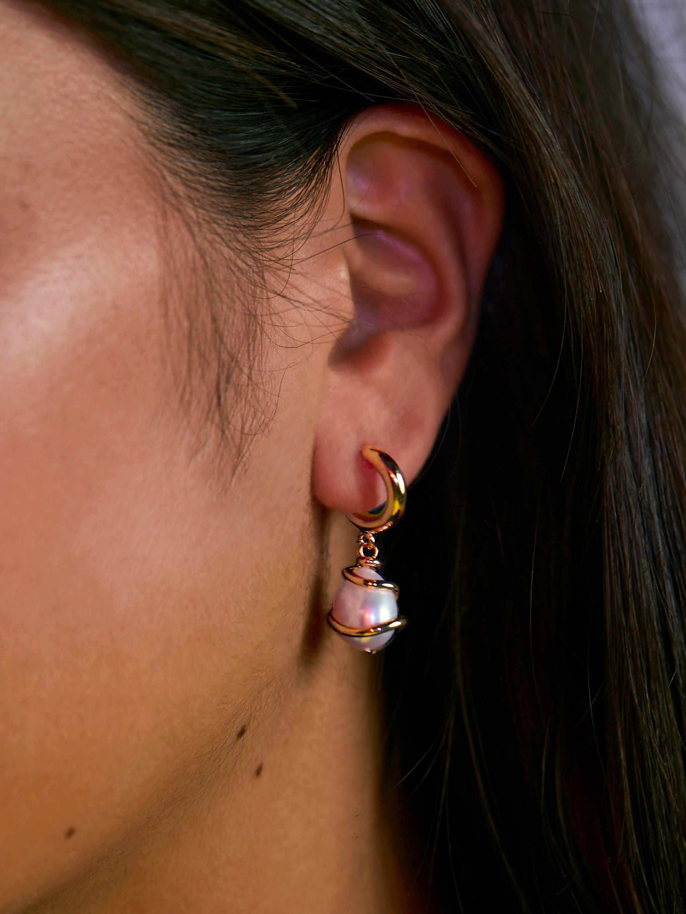 Product image 3 of 3, which shows Estella Bartlett Pearl Wrap Hoop Earrings, Gold