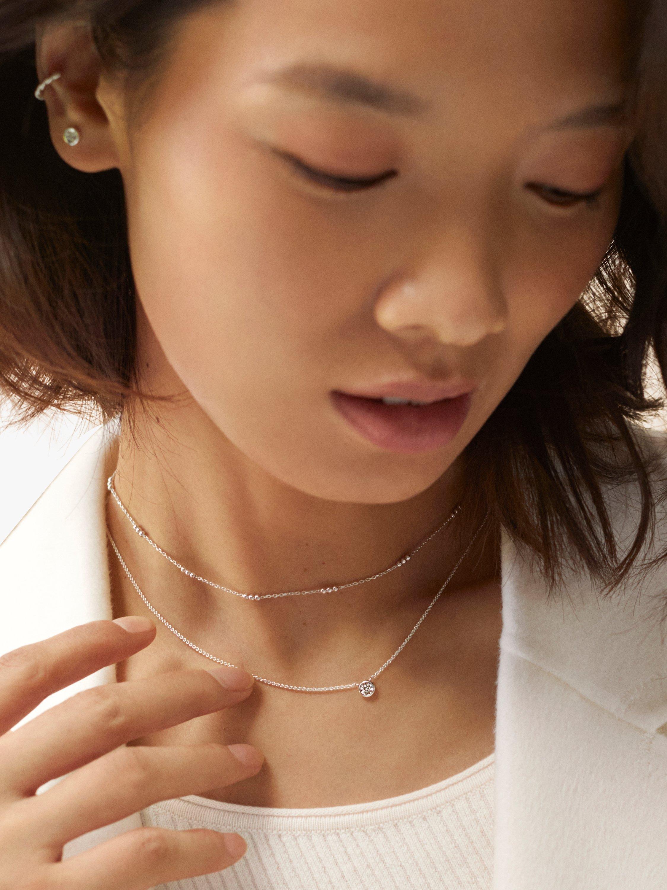 Product image 4 of 4, which shows Monica Vinader Triple Bead Guiding Star Pendant Necklace, Silver