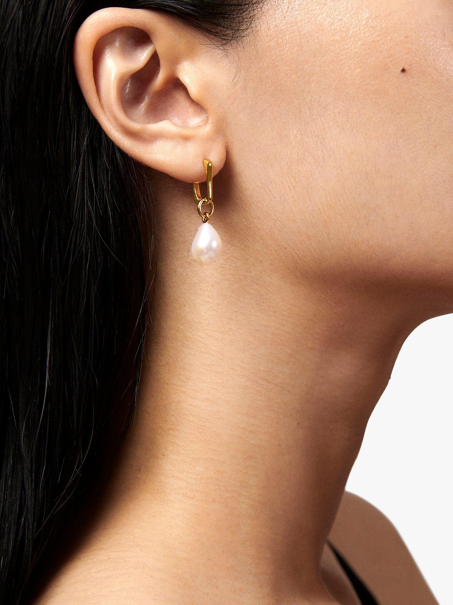 Product image 2 of 7, which shows Monica Vinader Alta Capture Pearl Huggie Earrings, Gold