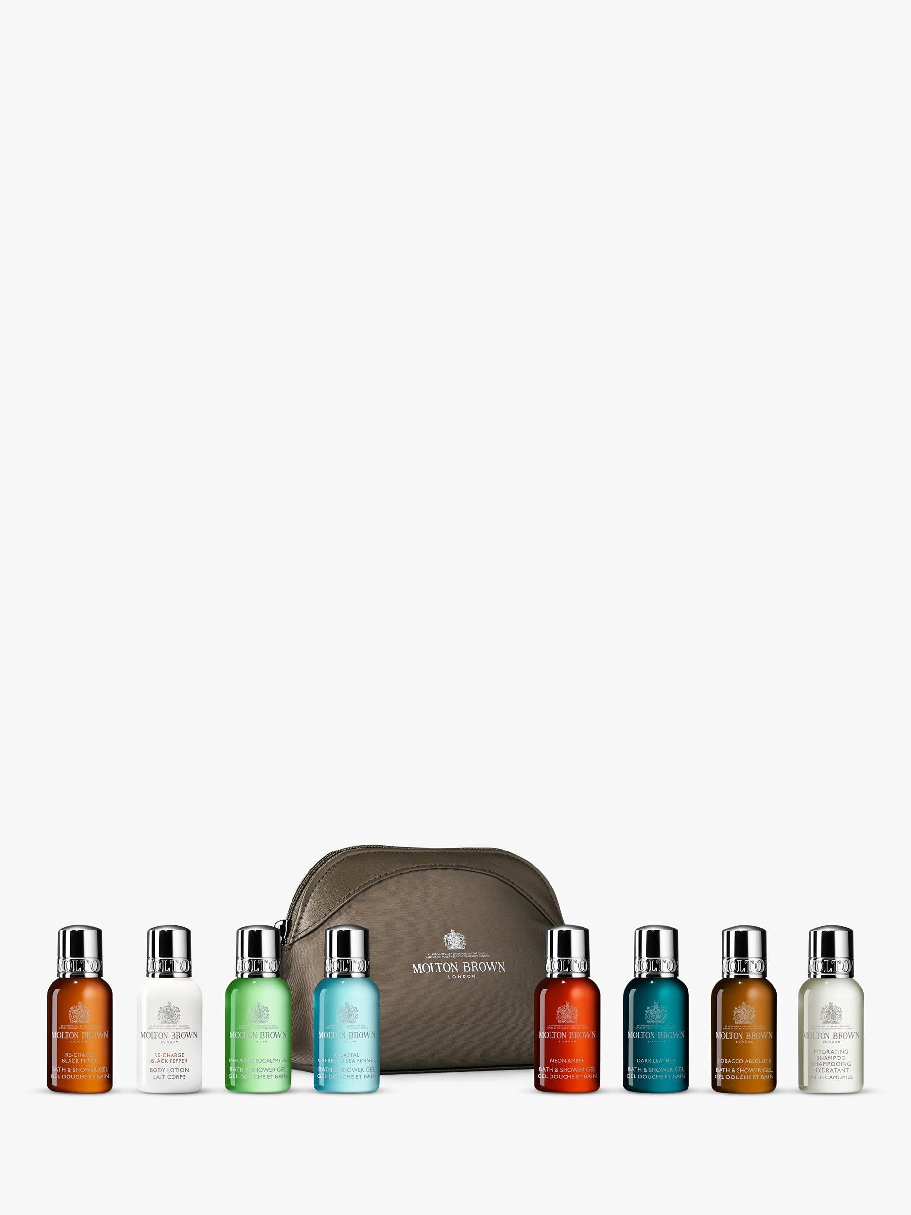 Product image 1 of 4, which shows Molton Brown The Classic Explorer Body & Hair Mini Travel Bag Set