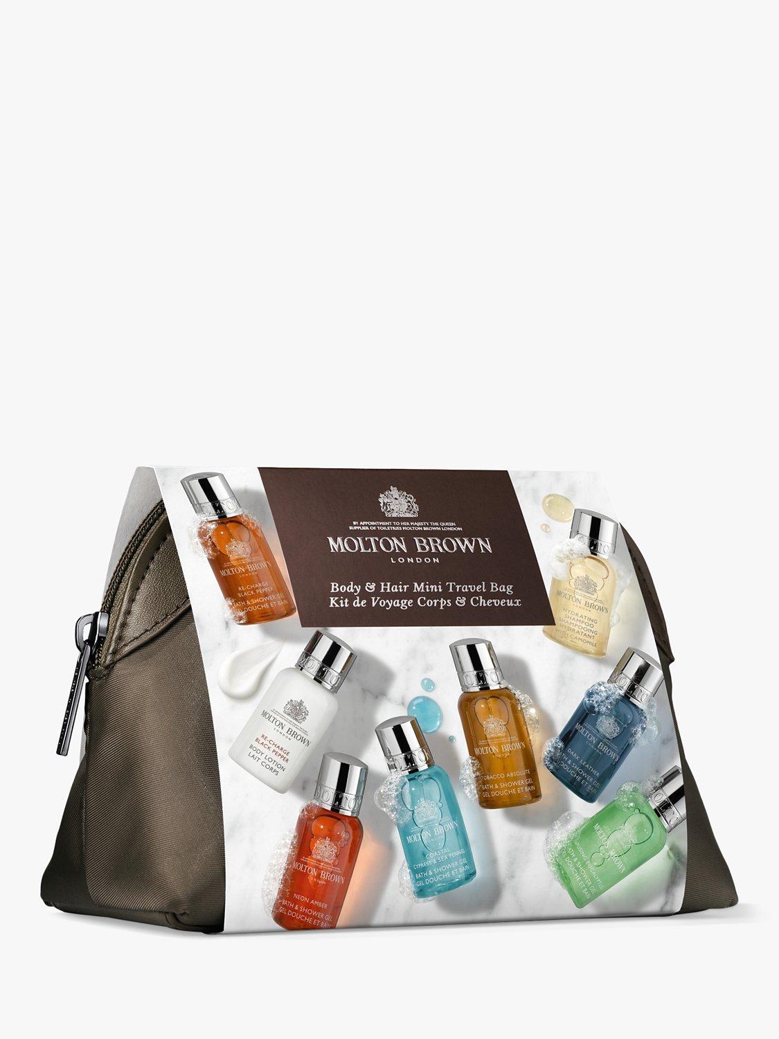 Product image 2 of 4, which shows Molton Brown The Classic Explorer Body & Hair Mini Travel Bag Set