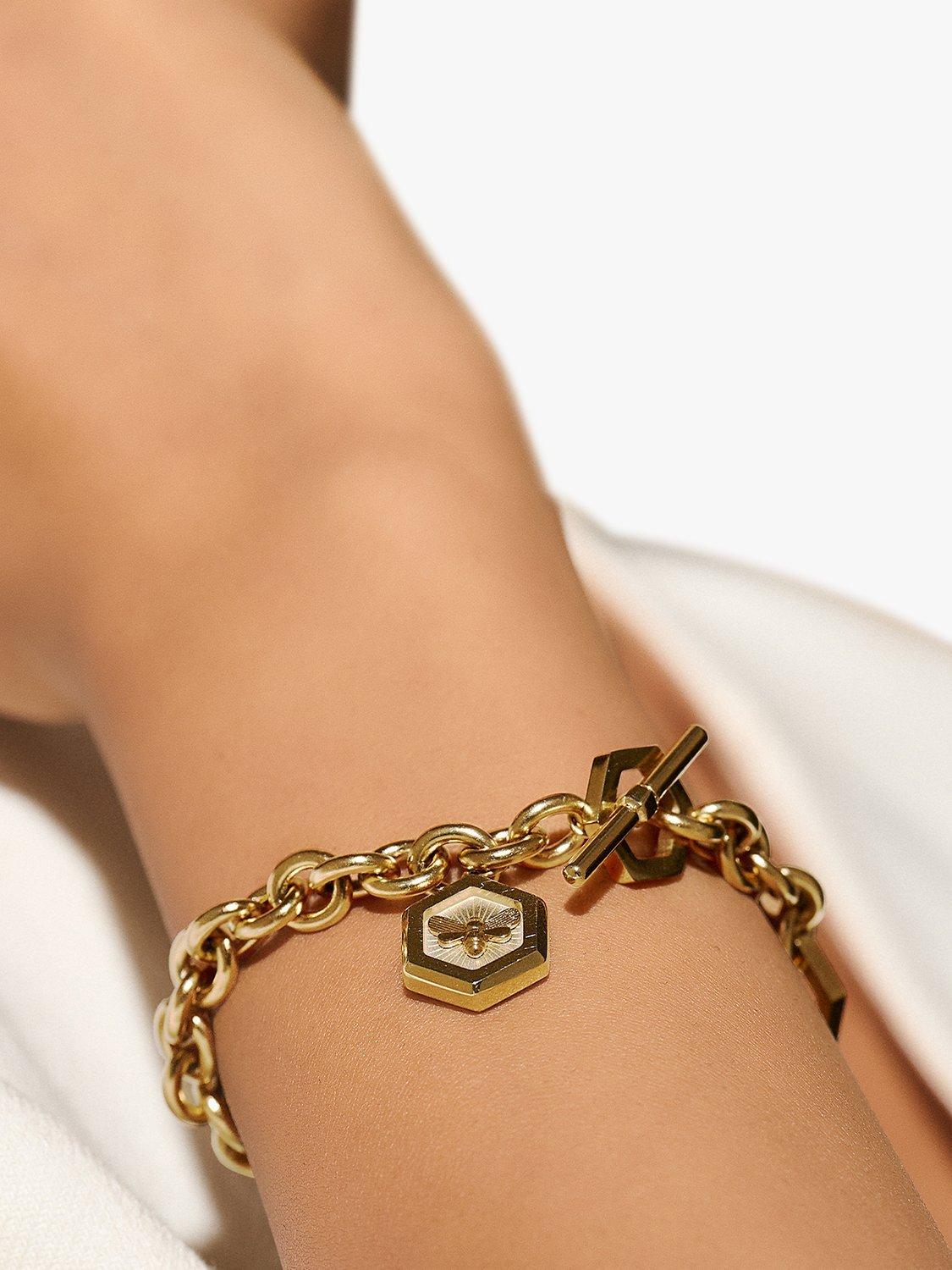 Product image 3 of 6, which shows Olivia Burton Bee & Honeycomb T-Bar Bracelet, Gold