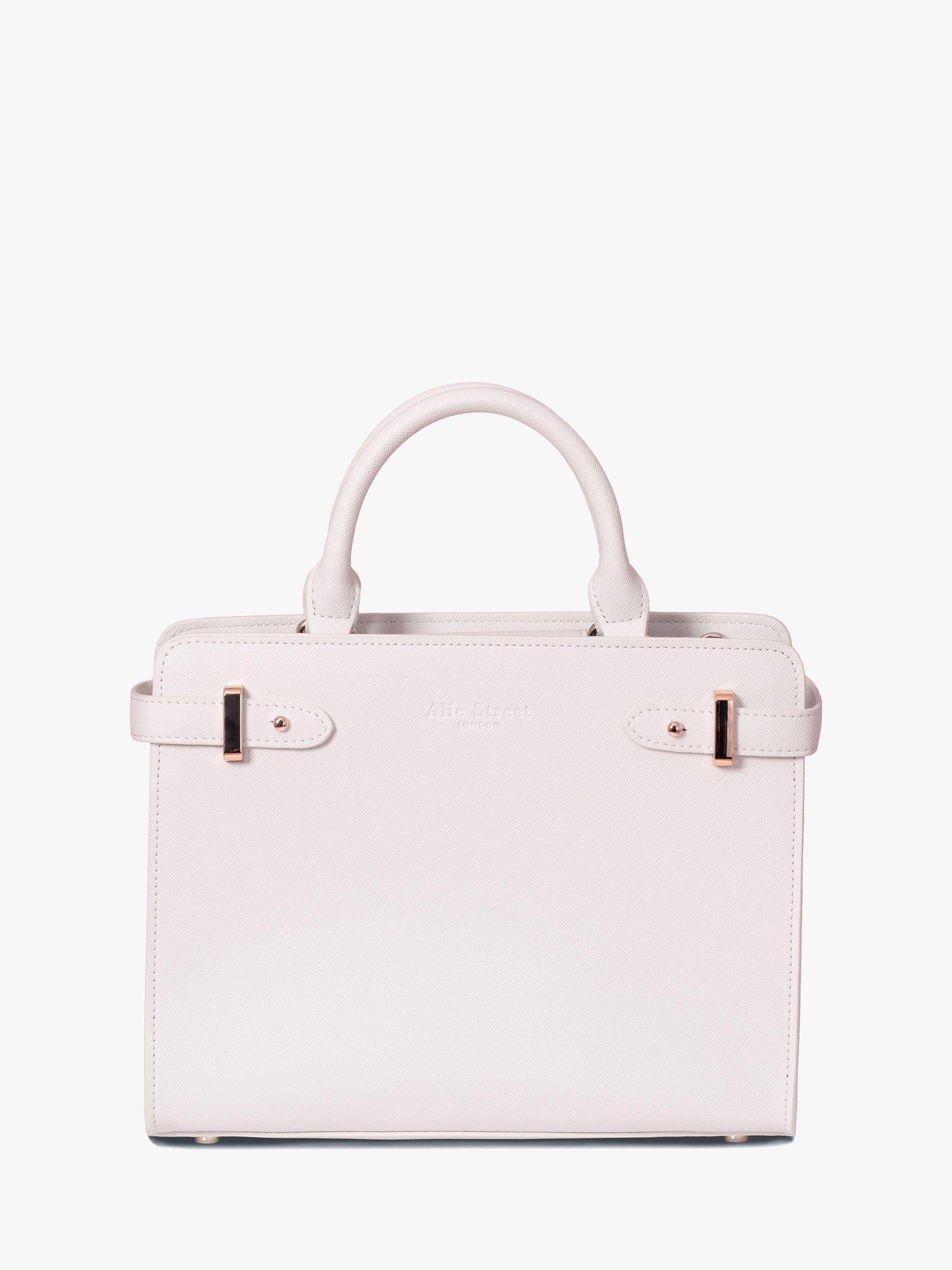 Product image 1 of 9, which shows Alie Street Derby Handbag, Nude