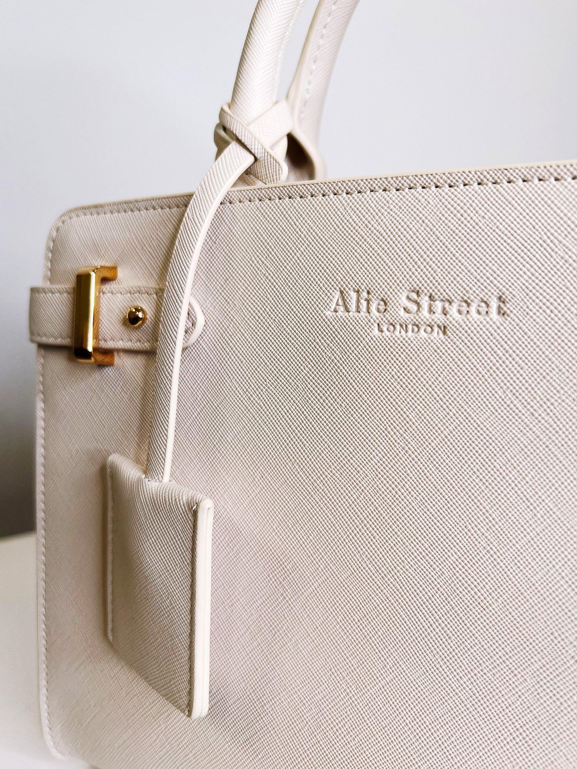 Product image 6 of 9, which shows Alie Street Derby Handbag, Nude