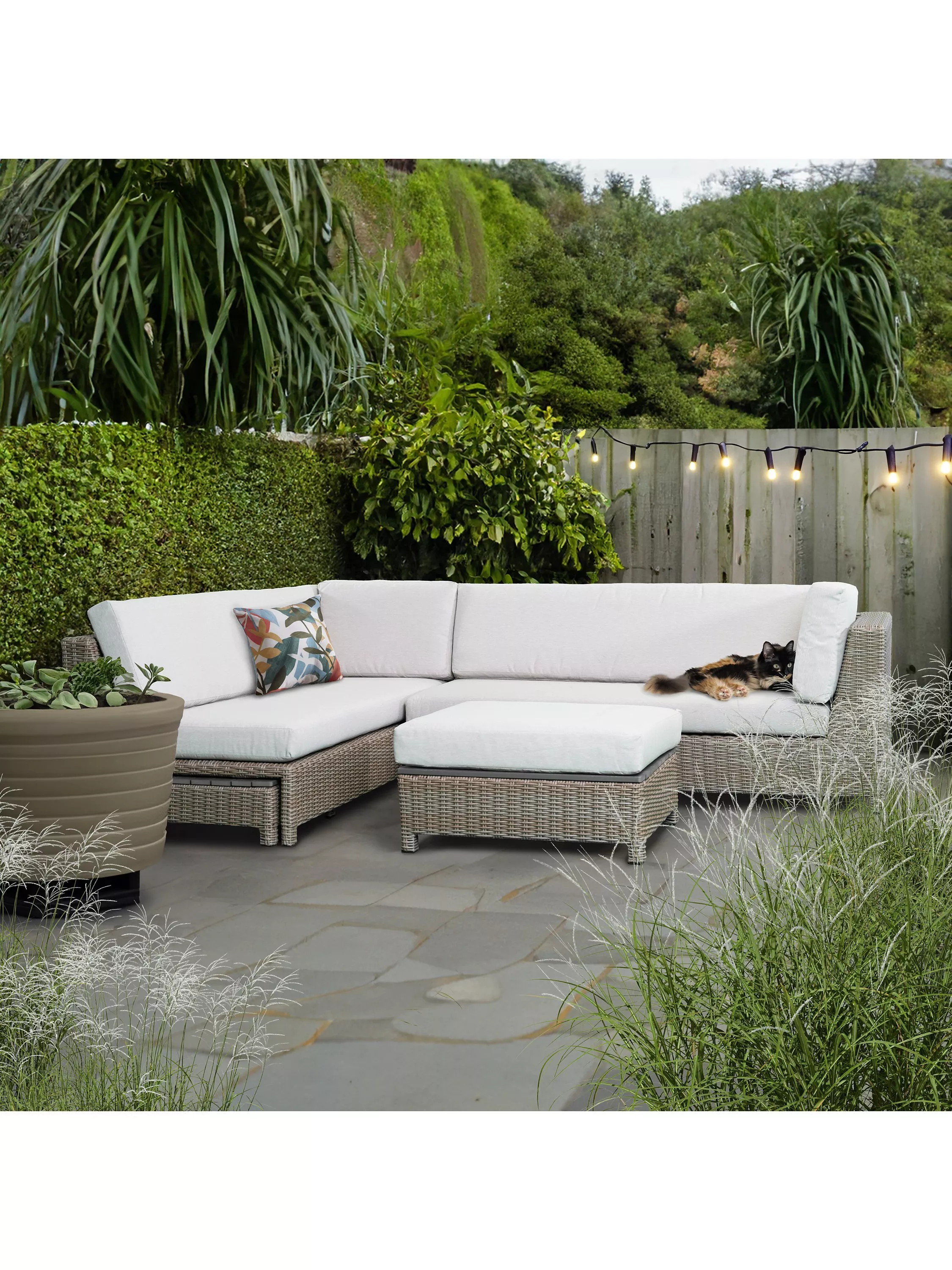 Rattan garden furniture set in a garden