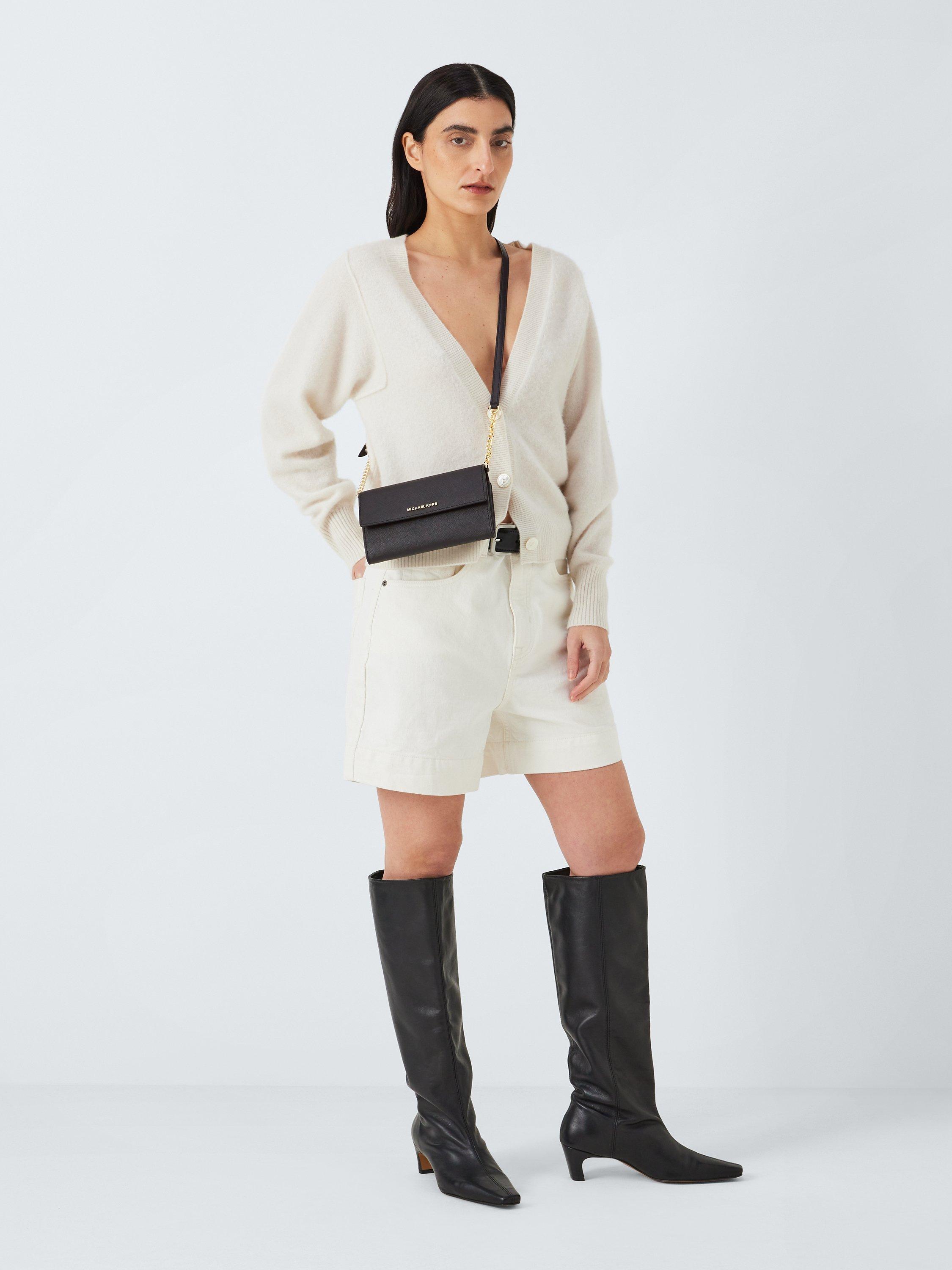 Product image 6 of 6, which shows Michael Kors Jet Set Leather Clutch Bag, Black
