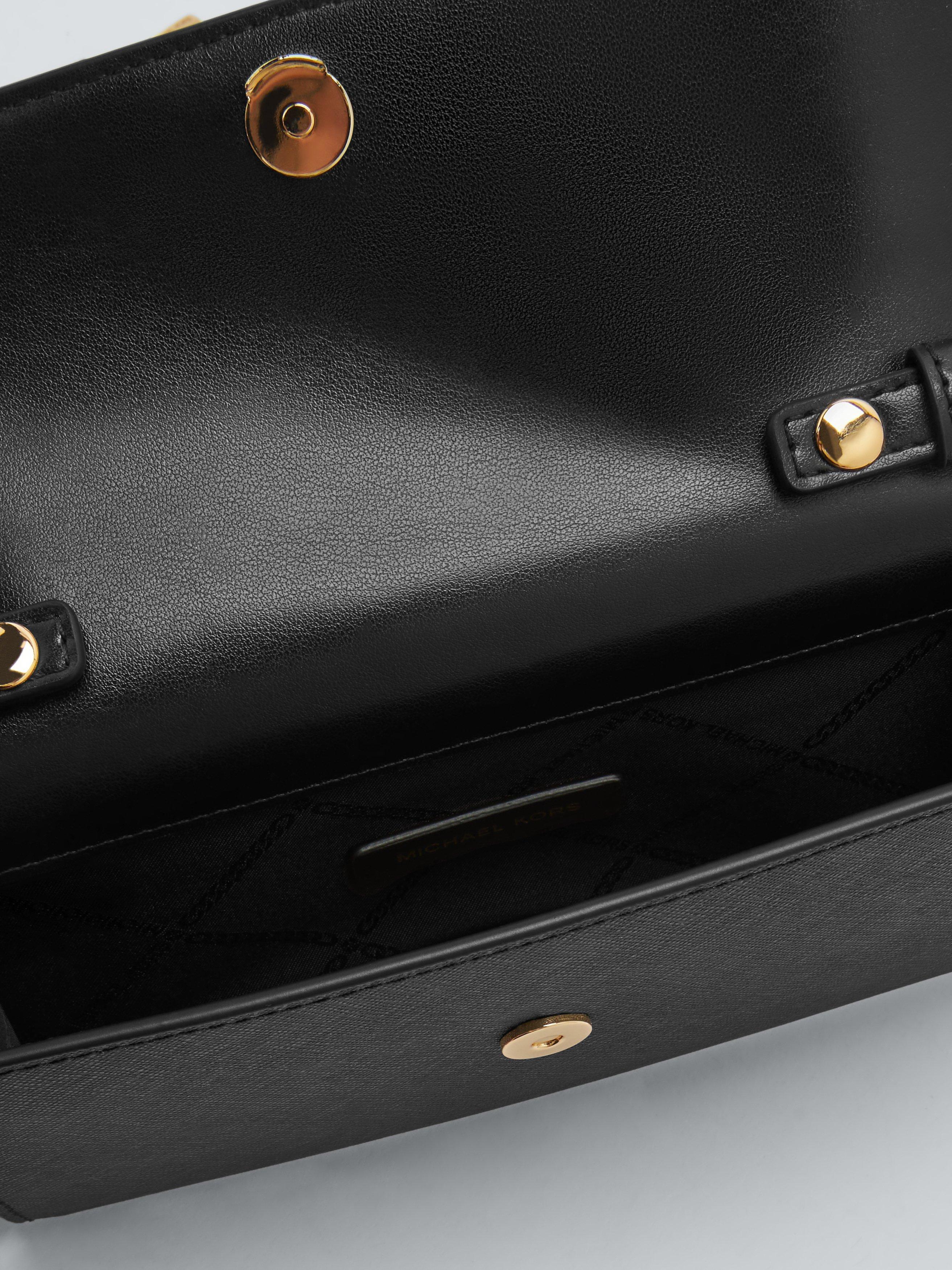 Product image 4 of 6, which shows Michael Kors Jet Set Leather Clutch Bag, Black