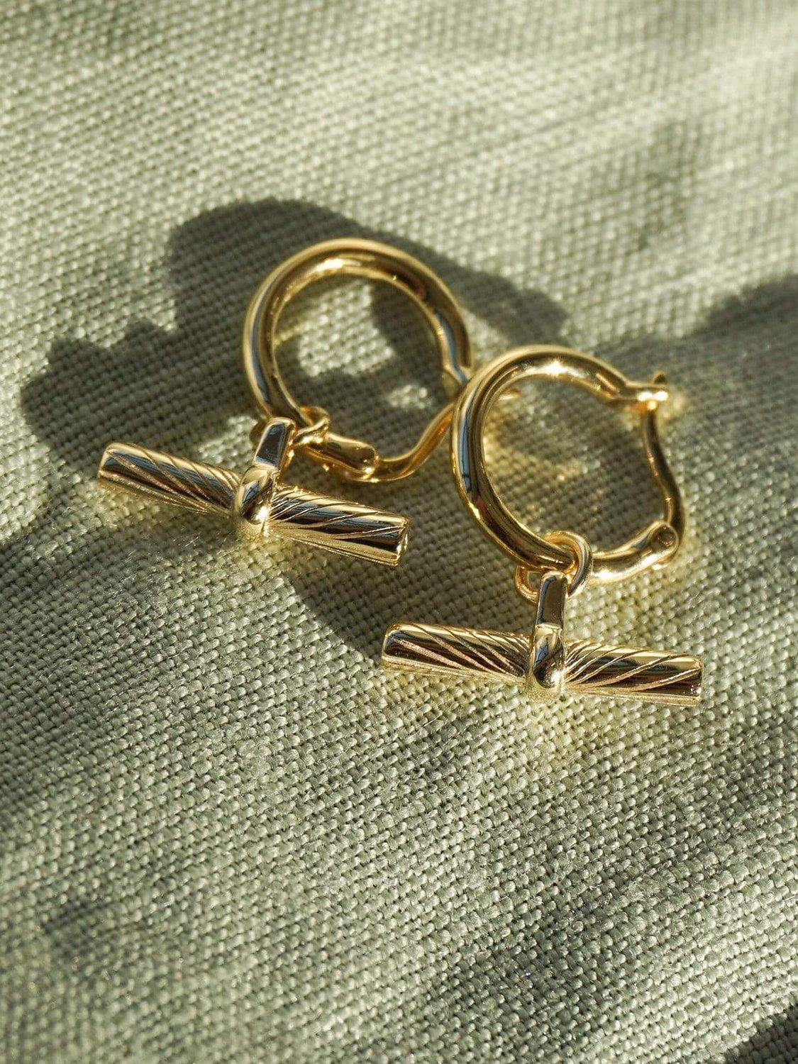 Product image 2 of 4, which shows Daisy London Estée Lalonde T-Bar Drop Earrings, Gold