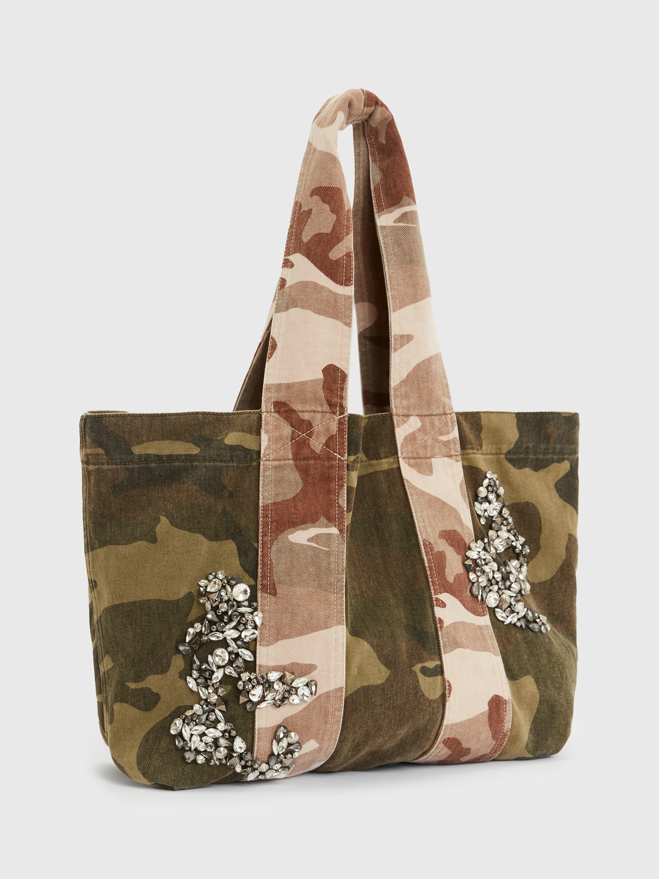 Product image 3 of 6, which shows AllSaints Airi Denim Camo Embellished Tote Bag, Multi