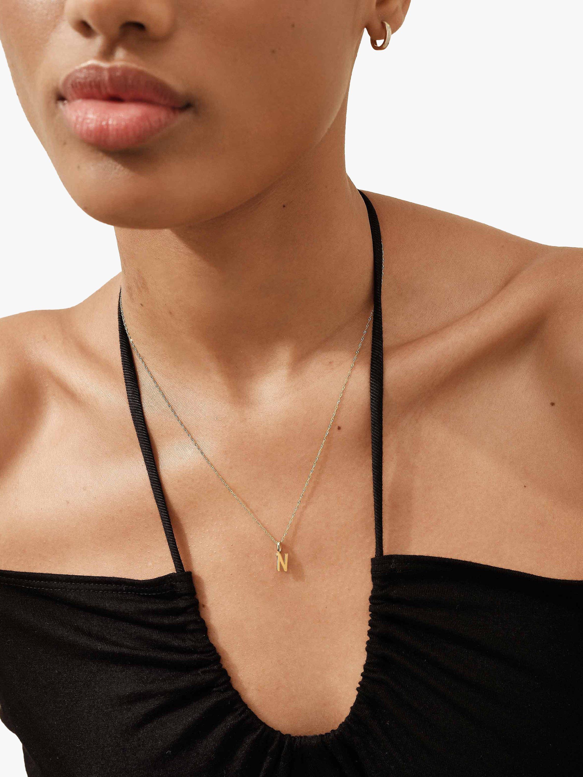 Product image 2 of 5, which shows Edge of Ember 14ct Gold Initial Pendant Necklace, Yellow Gold, E
