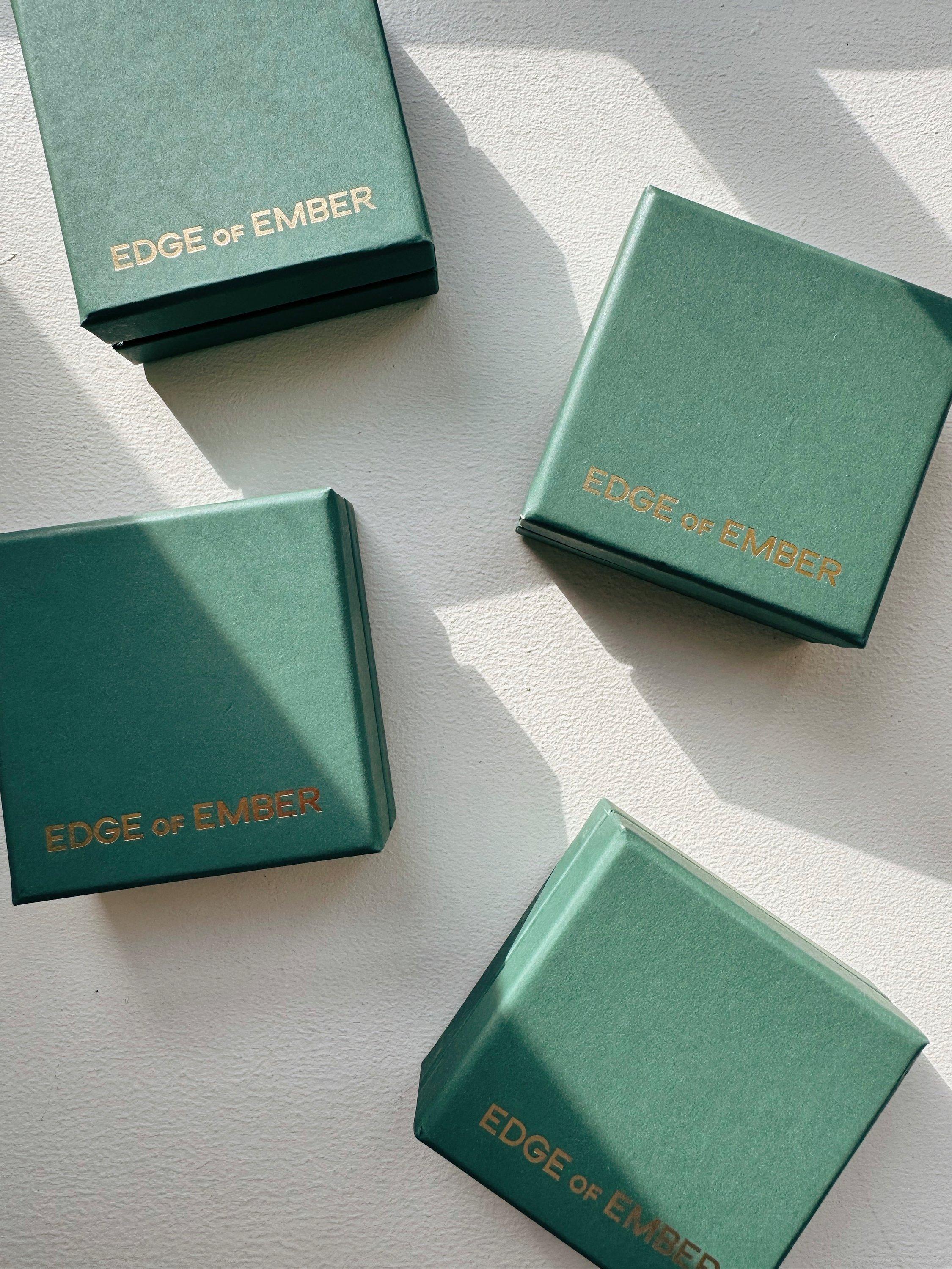 Product image 5 of 5, which shows Edge of Ember Flare Hoop Earrings, Gold