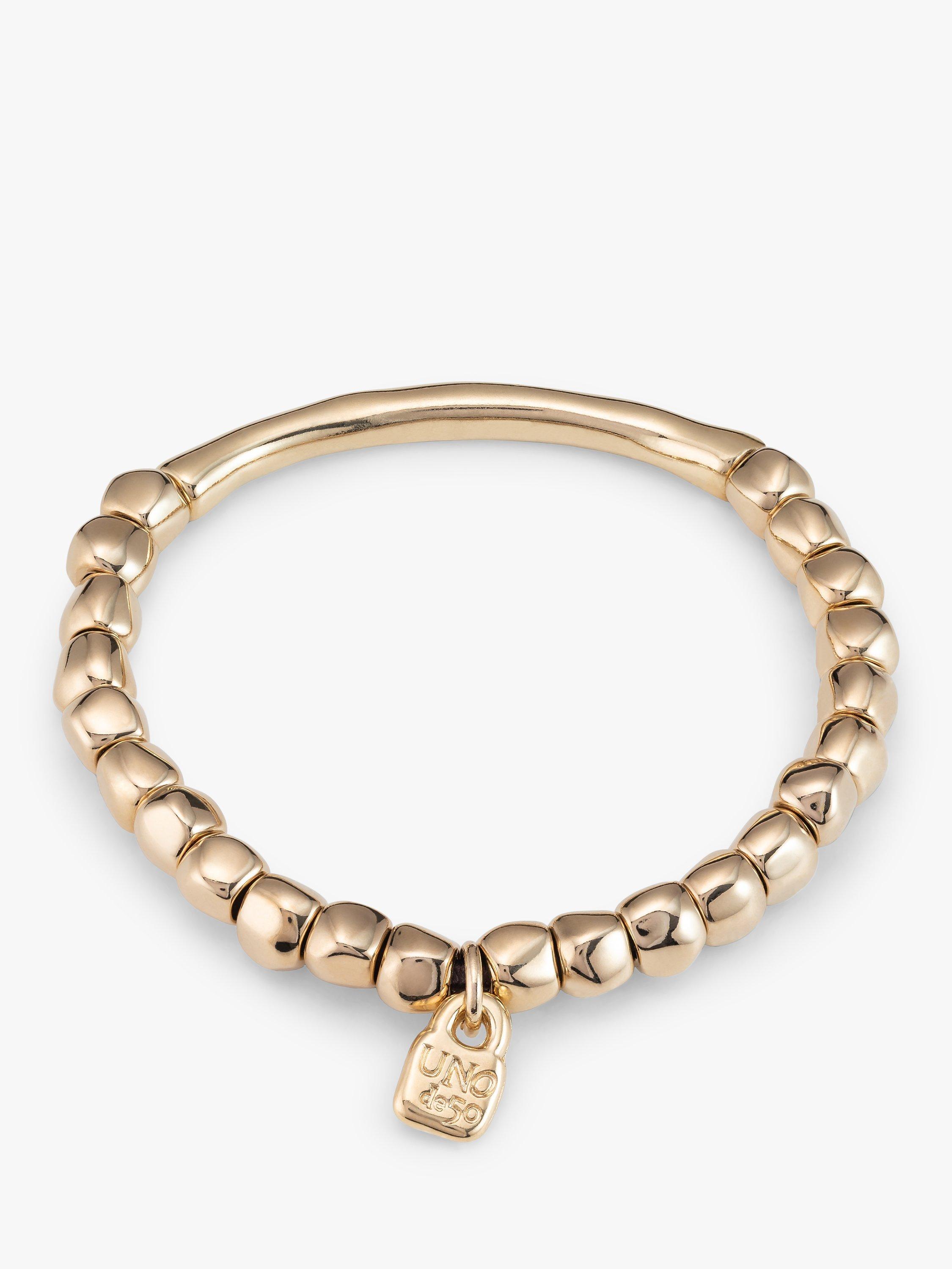 Product image 2 of 5, which shows UNOde50 Beaded Tube Bracelet, Gold