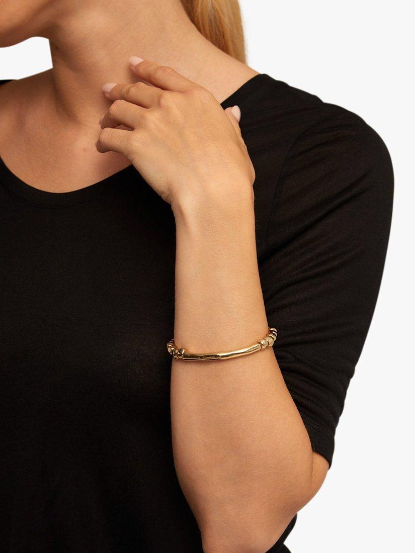 Product image 4 of 5, which shows UNOde50 Beaded Tube Bracelet, Gold