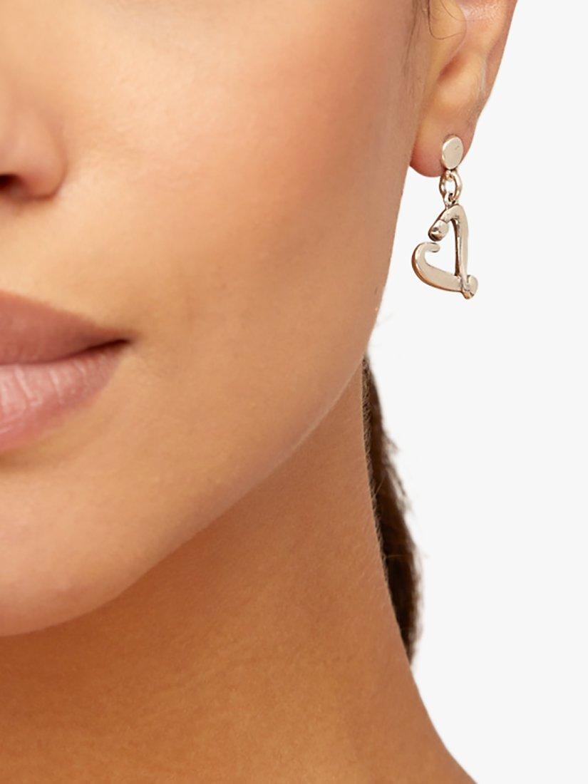 Product image 3 of 4, which shows UNOde50 Love Collection Nailed Heart Drop Earrings, Silver