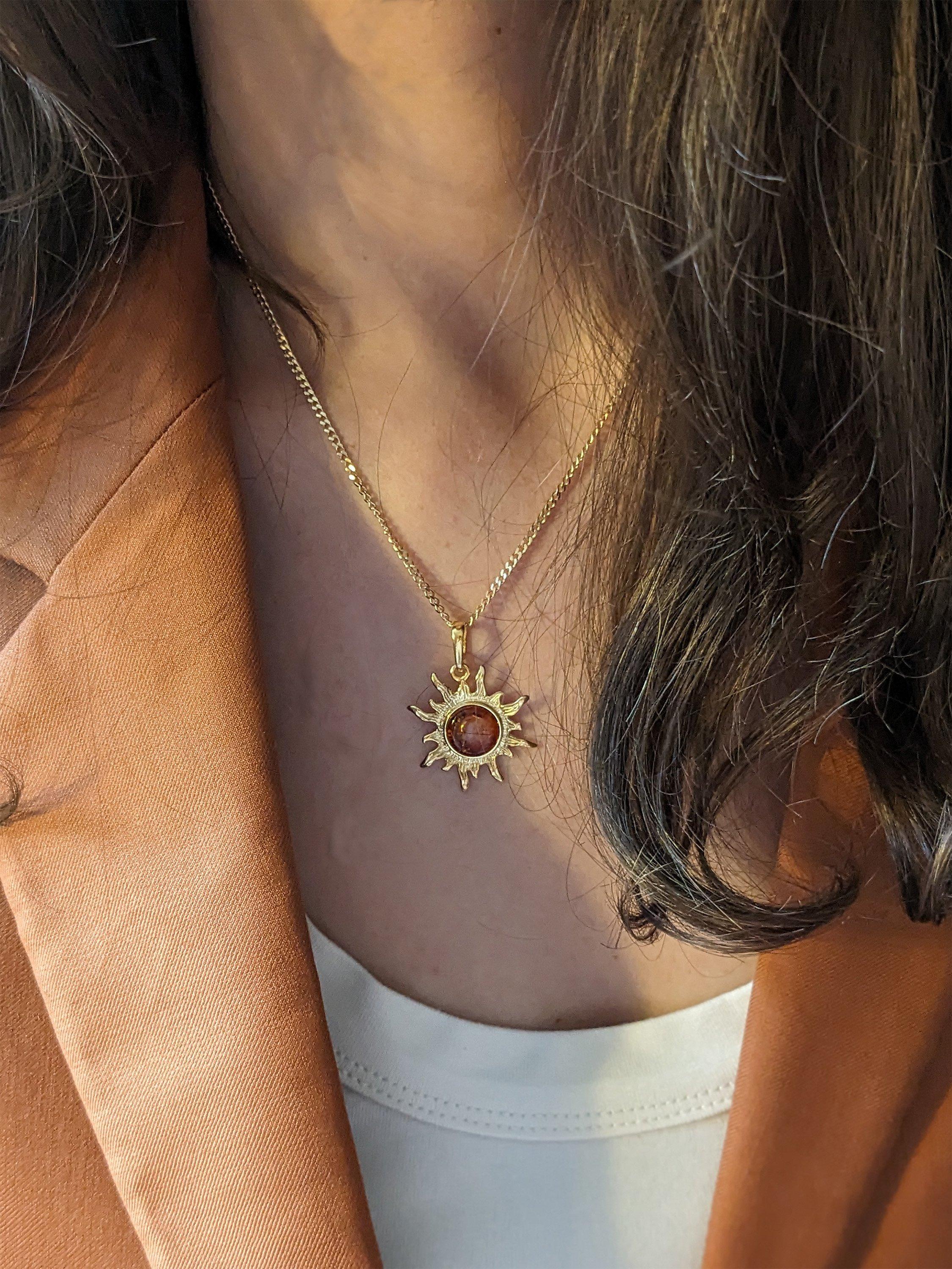 Product image 2 of 4, which shows Be-Jewelled Baltic Amber Sunburst Pendant Necklace, Gold/Cognac