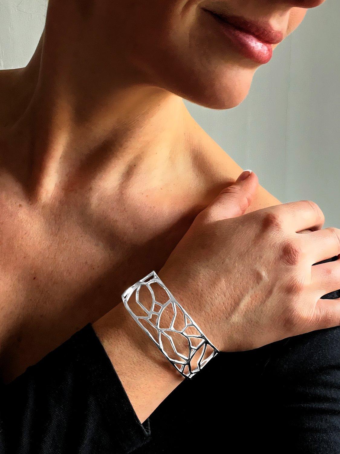 Product image 3 of 6, which shows Nina B Cut Out Design Open Cuff Bangle, Silver