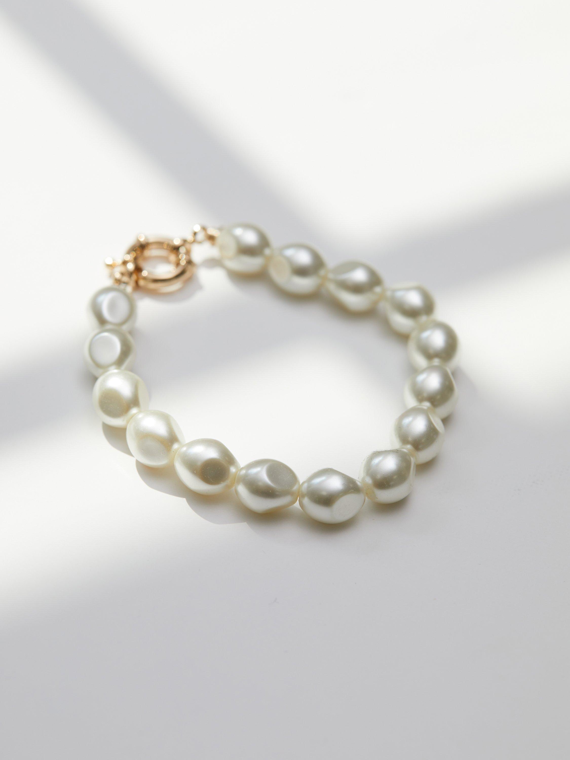 Product image 1 of 2, which shows Jon Richard Cream Pearlised Baroque Bracelet, Natural