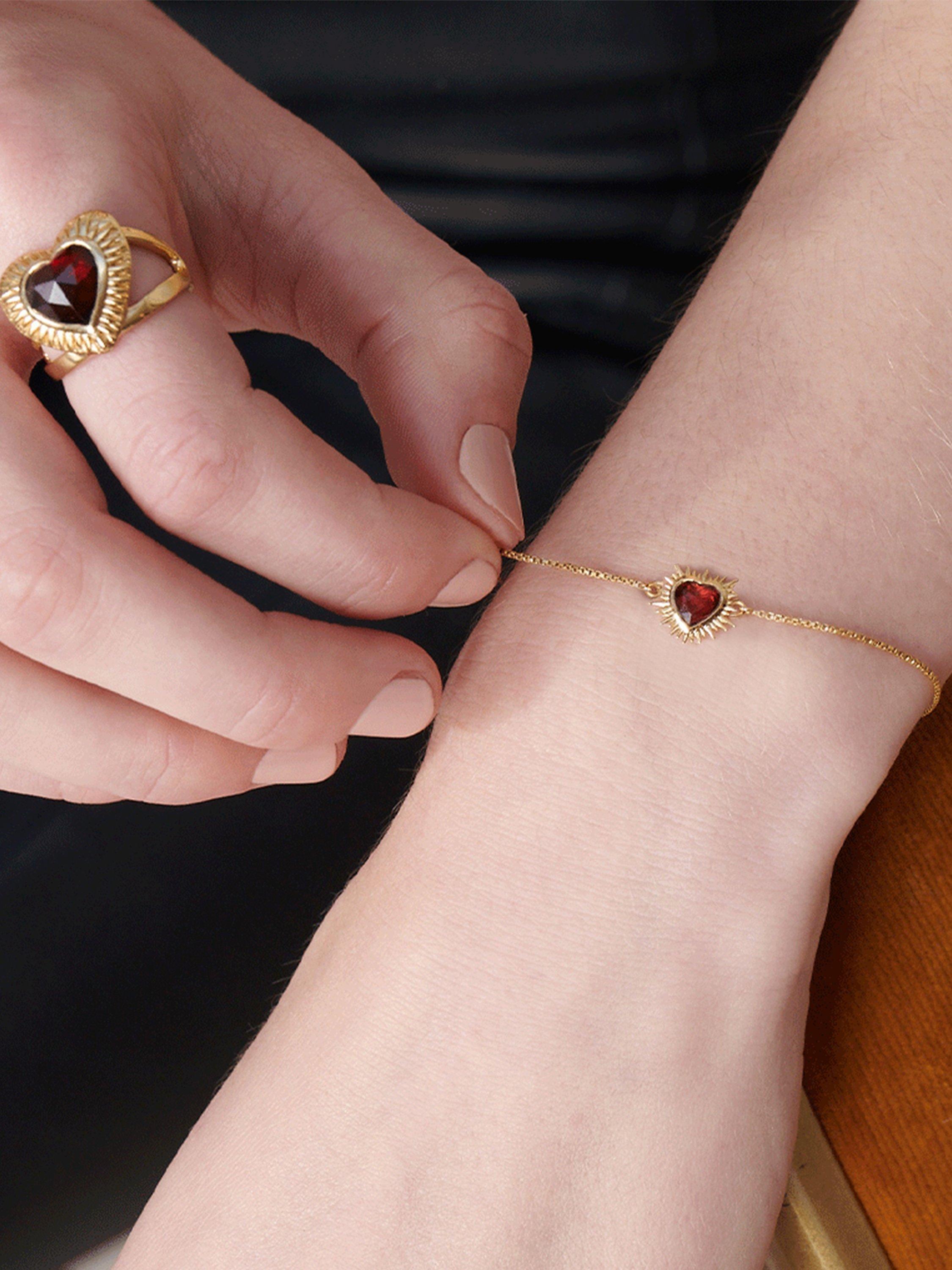 Product image 2 of 4, which shows Rachel Jackson London Electric Love Garnet Heart Bracelet, Gold