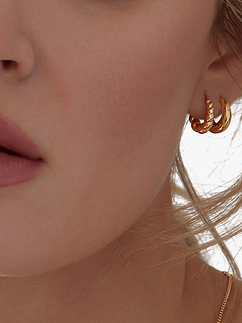 Product image 2 of 3, which shows Rachel Jackson London Chubby Twisted Huggie Hoop Earrings, Gold