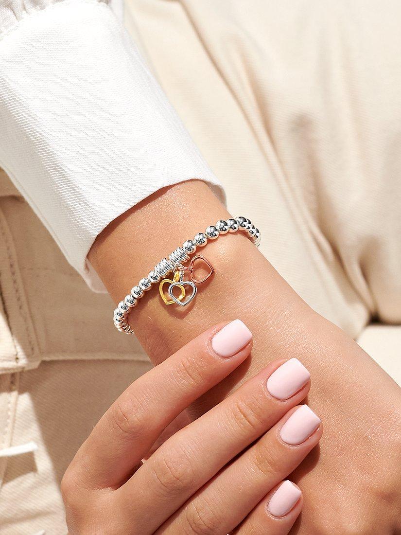 Product image 3 of 4, which shows Joma Jewellery Triple Heart Charm Stretch Bracelet, Multi