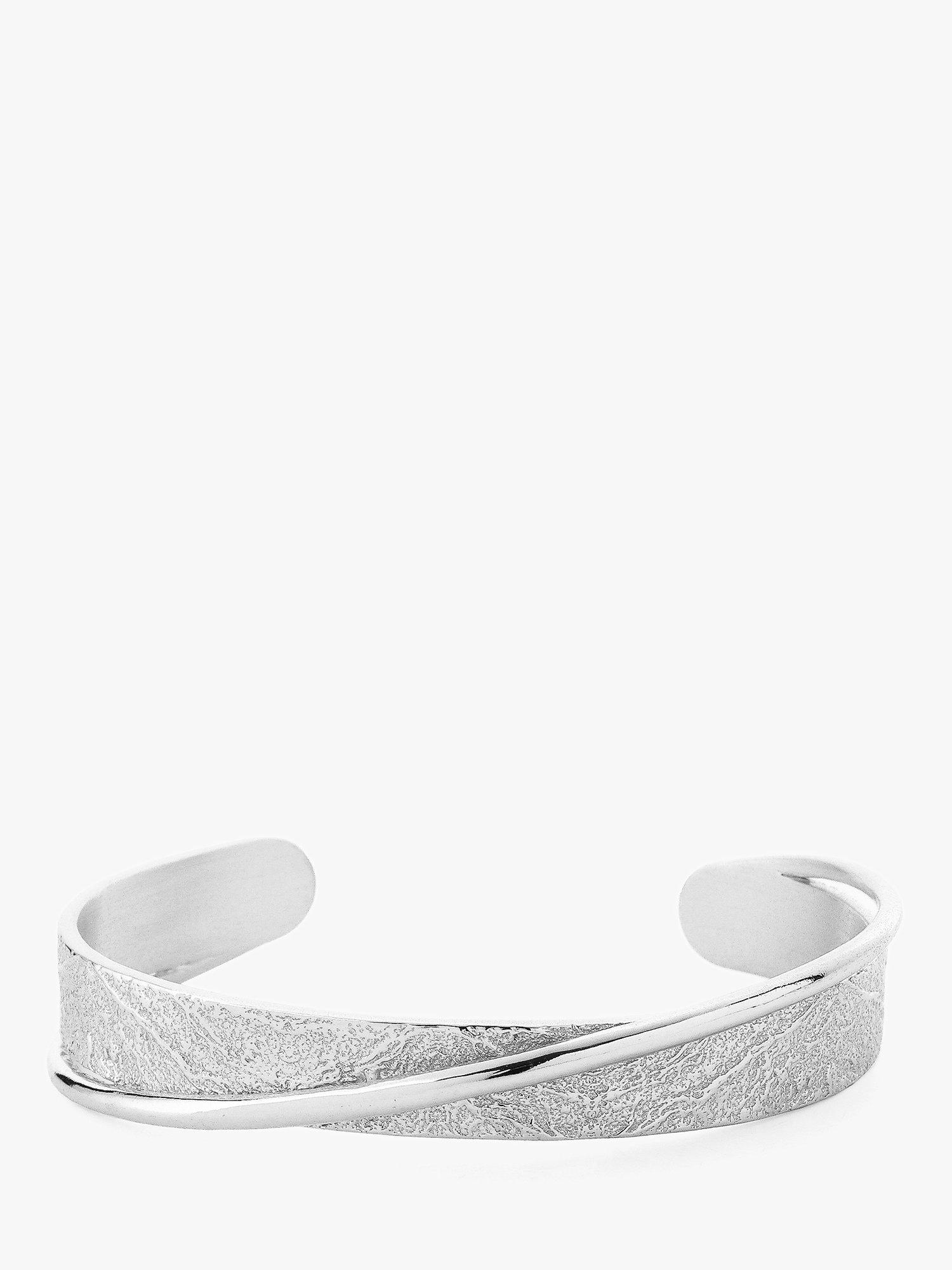 Product image 1 of 3, which shows Tutti & Co Joy Textured Open End Bangle, Silver