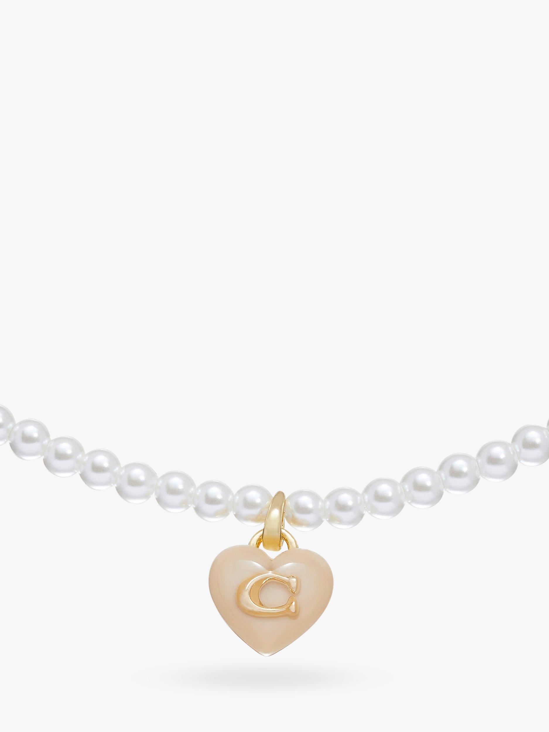 Product image 2 of 3, which shows Coach Sculpted C Heart Pendant Faux Pearl Choker Necklace, Pearl/Gold