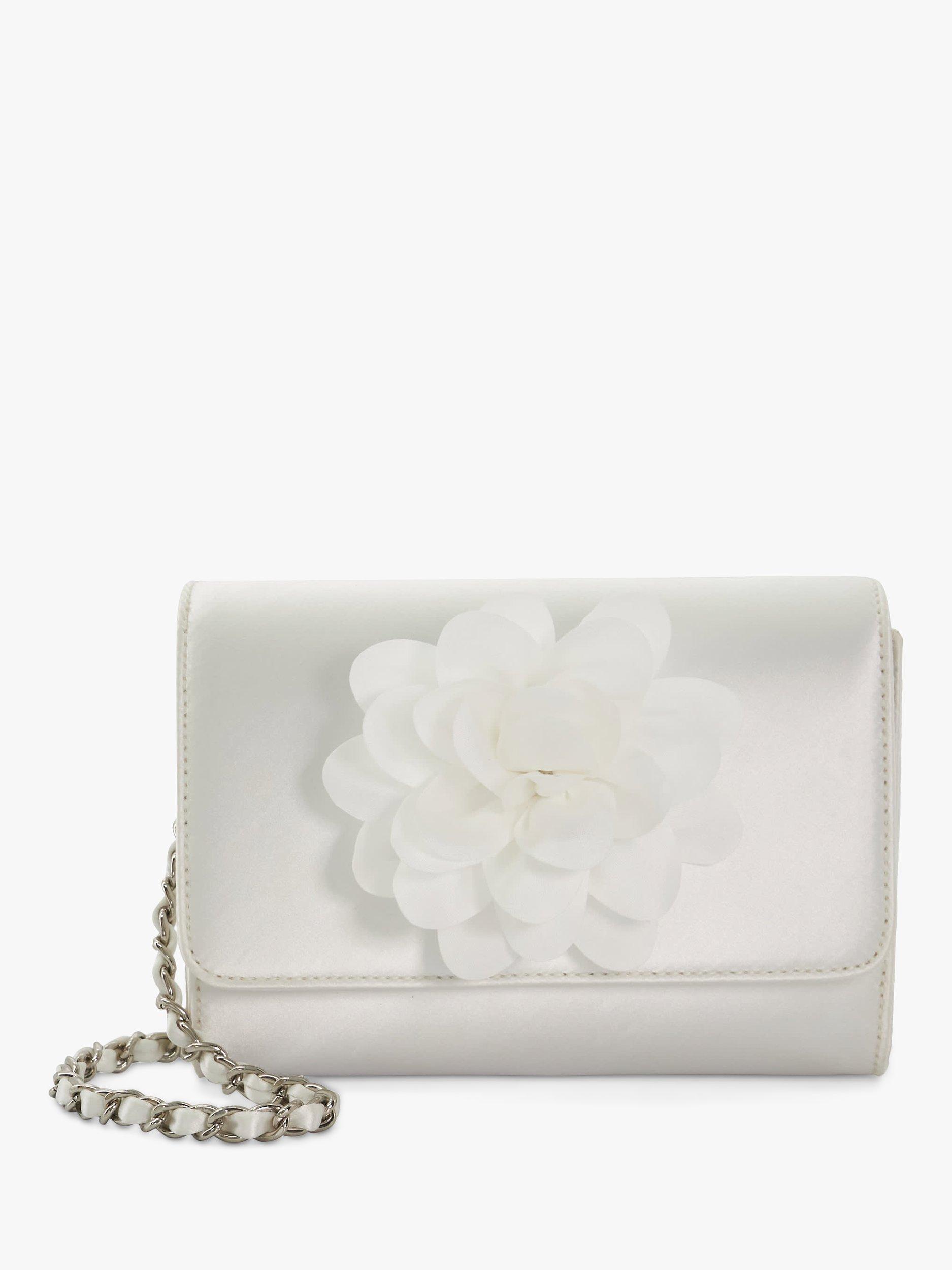 Product image 1 of 5, which shows Dune London Blossoming Satin Flower Clutch Bag, White