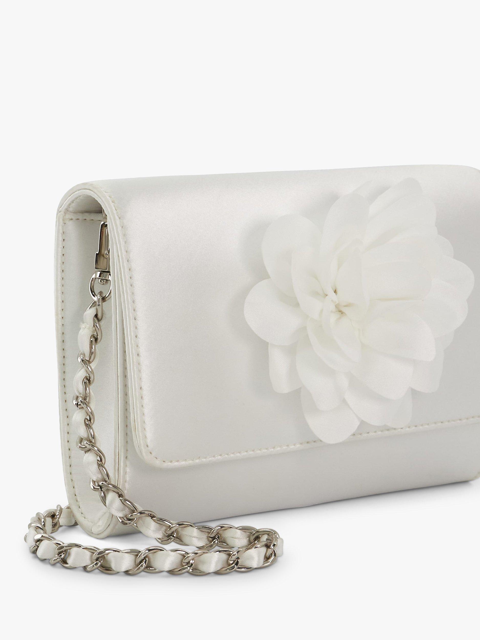 Product image 4 of 5, which shows Dune London Blossoming Satin Flower Clutch Bag, White