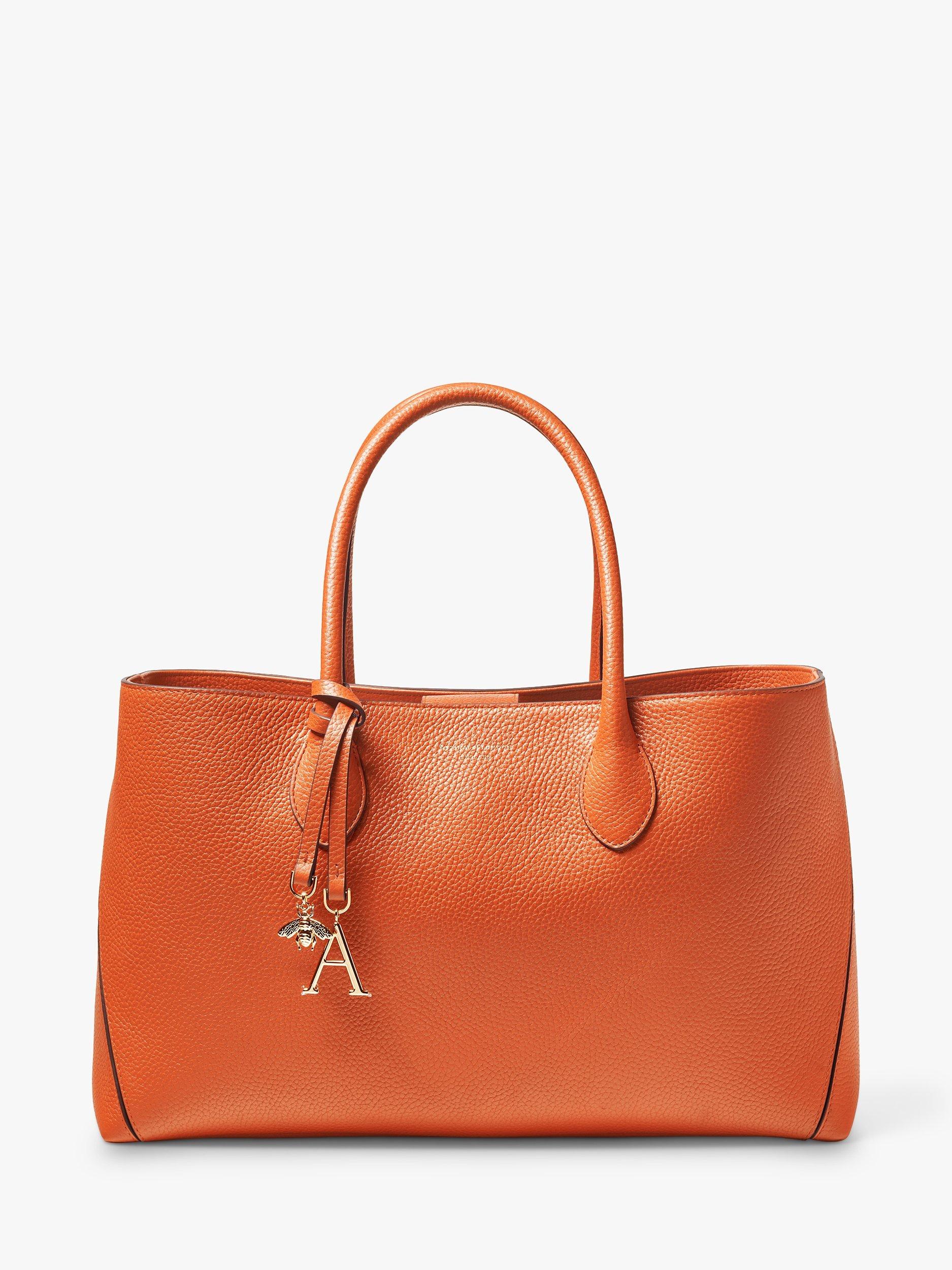 Product image 1 of 6, which shows Aspinal of London Pebble Leather London Tote Bag, Orange
