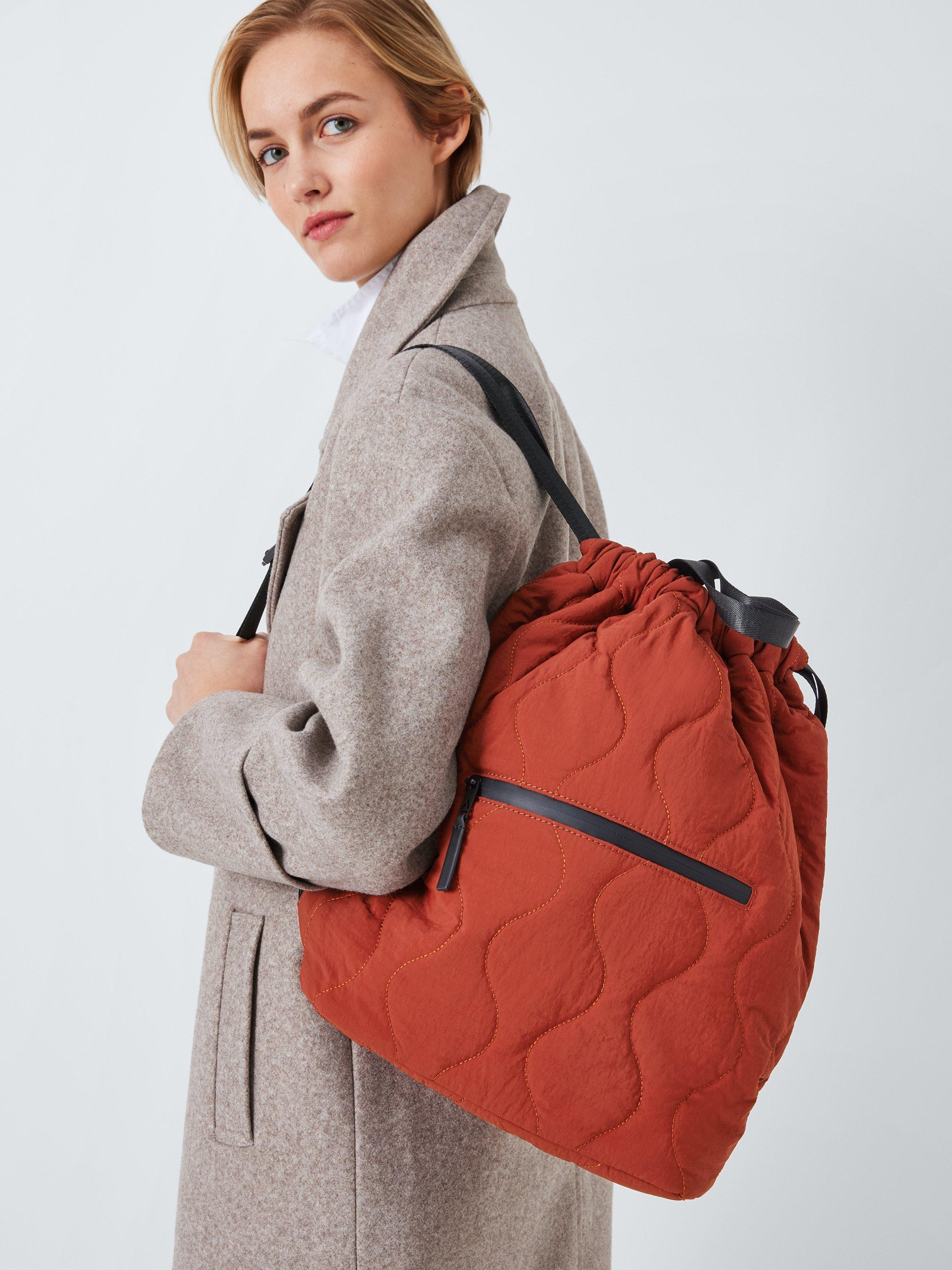 Product image 6 of 6, which shows John Lewis ANYDAY Quilted Drawstring Backpack, Brown