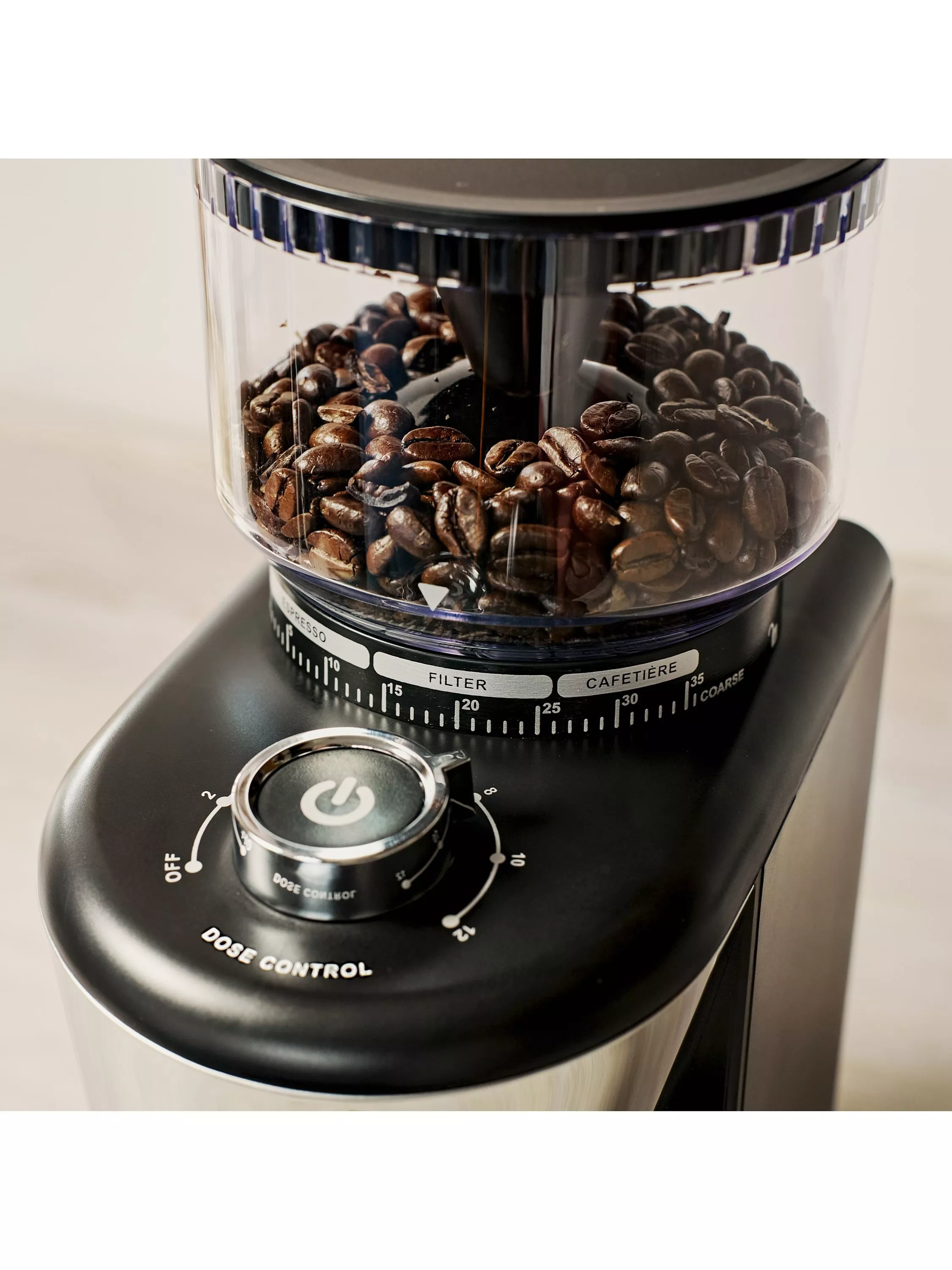 Coffee beans in a grinder