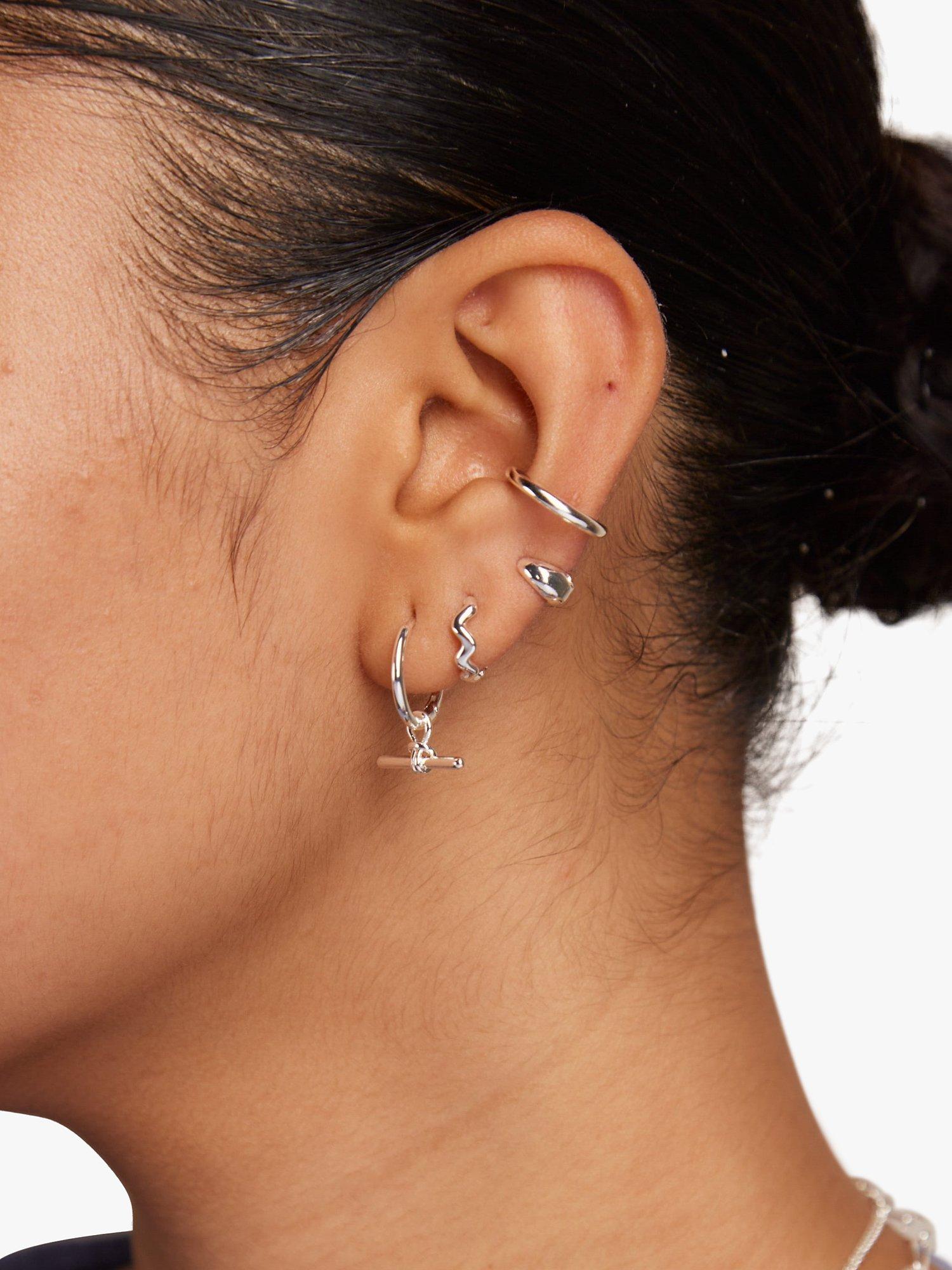 Product image 2 of 2, which shows Orelia Dainty T-Bar Knot Detail Hoop Earrings, Silver