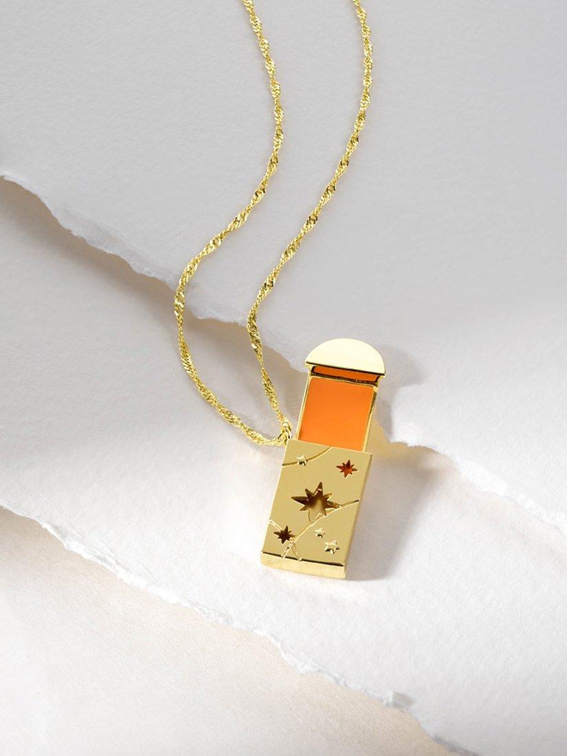 Product image 2 of 10, which shows Wanderlust + Co Red Packet Pendant Necklace, Gold