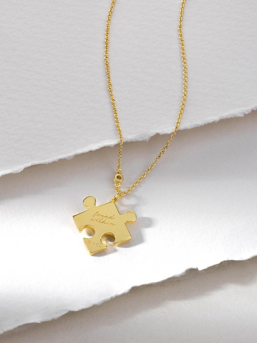 Product image 2 of 8, which shows Wanderlust + Co Puzzle Piece Pendant Necklace, Gold