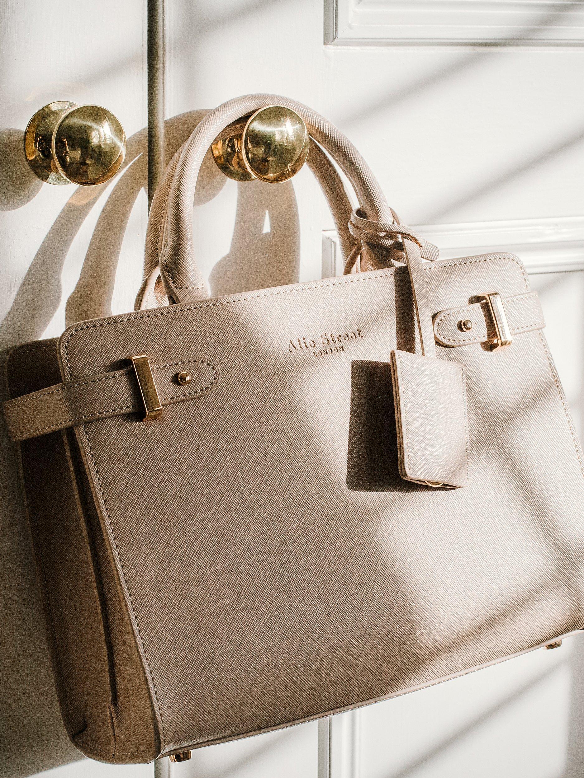 Product image 9 of 9, which shows Alie Street Derby Handbag, Classic Taupe