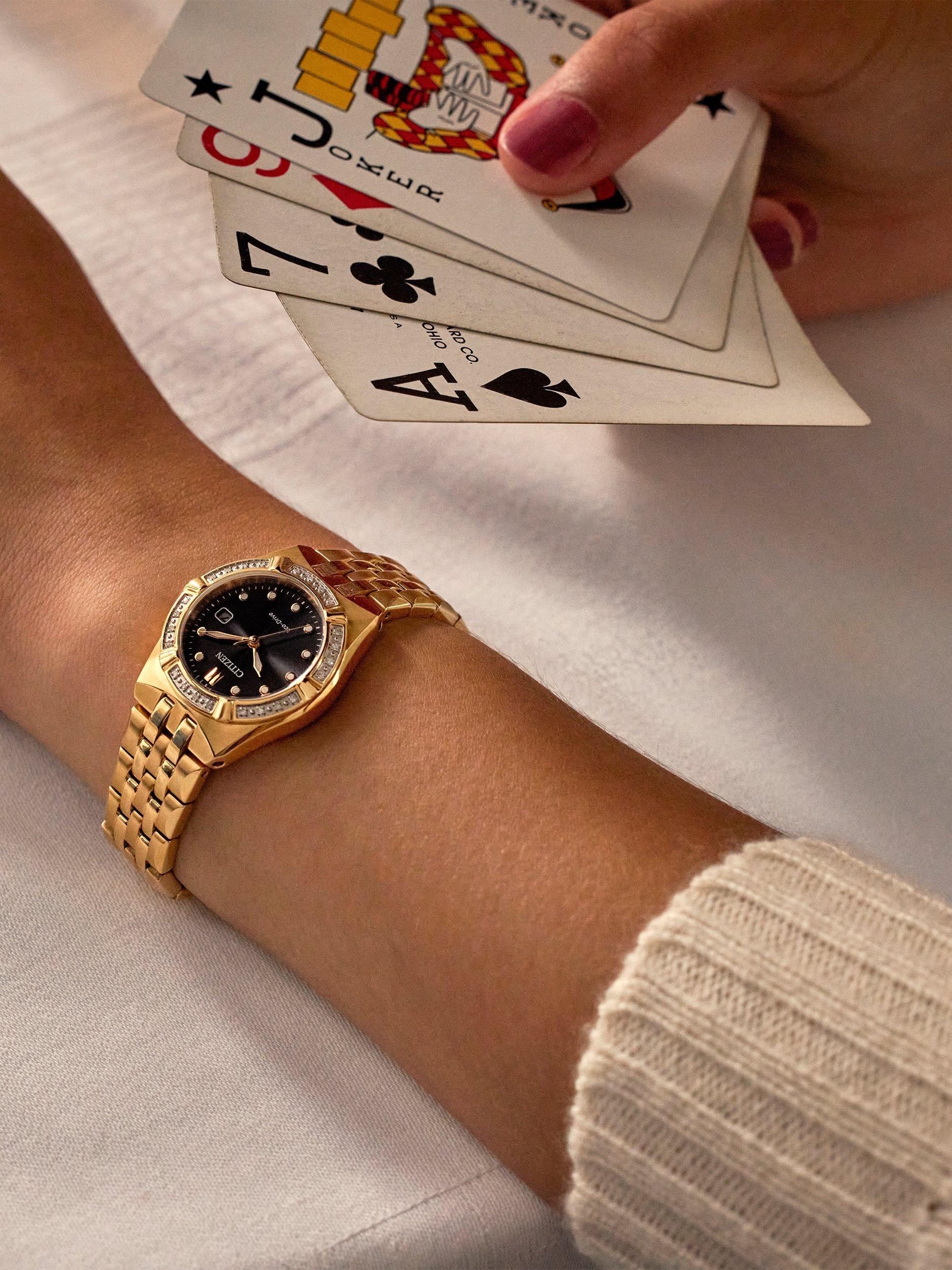 Product image 4 of 4, which shows Citizen EW2712-55E Women's Eco-Drive Date Bracelet Strap Watch, Gold/Black