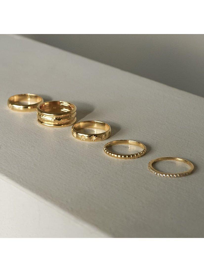 Product image 2 of 4, which shows Daisy London Star Engraved Band Ring, Gold, P