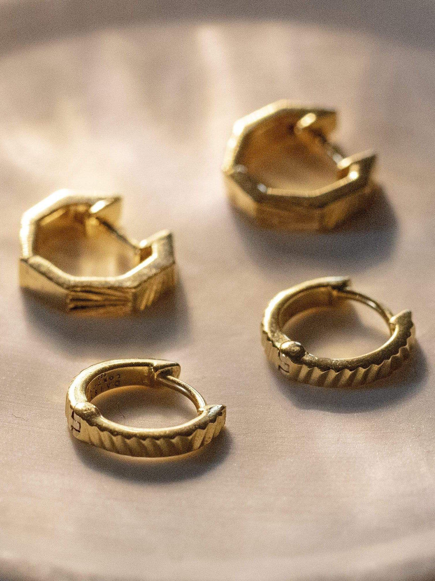 Product image 2 of 4, which shows Daisy London Textured Huggie Hoop Earrings, Pack of 2 Pairs, Gold