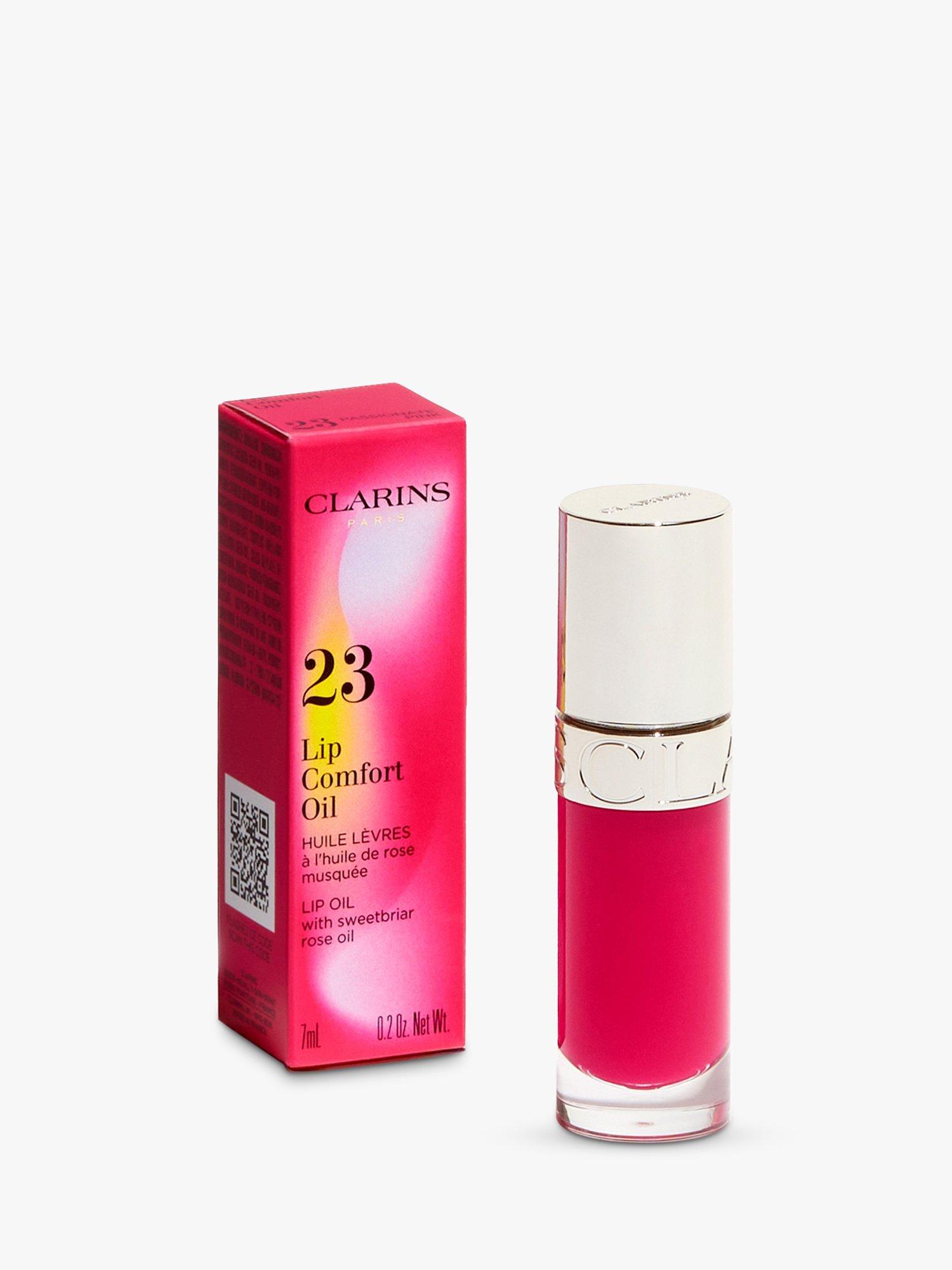 Product image 6 of 9, which shows Clarins Limited Edition Lip Comfort Oil, 23 Pink