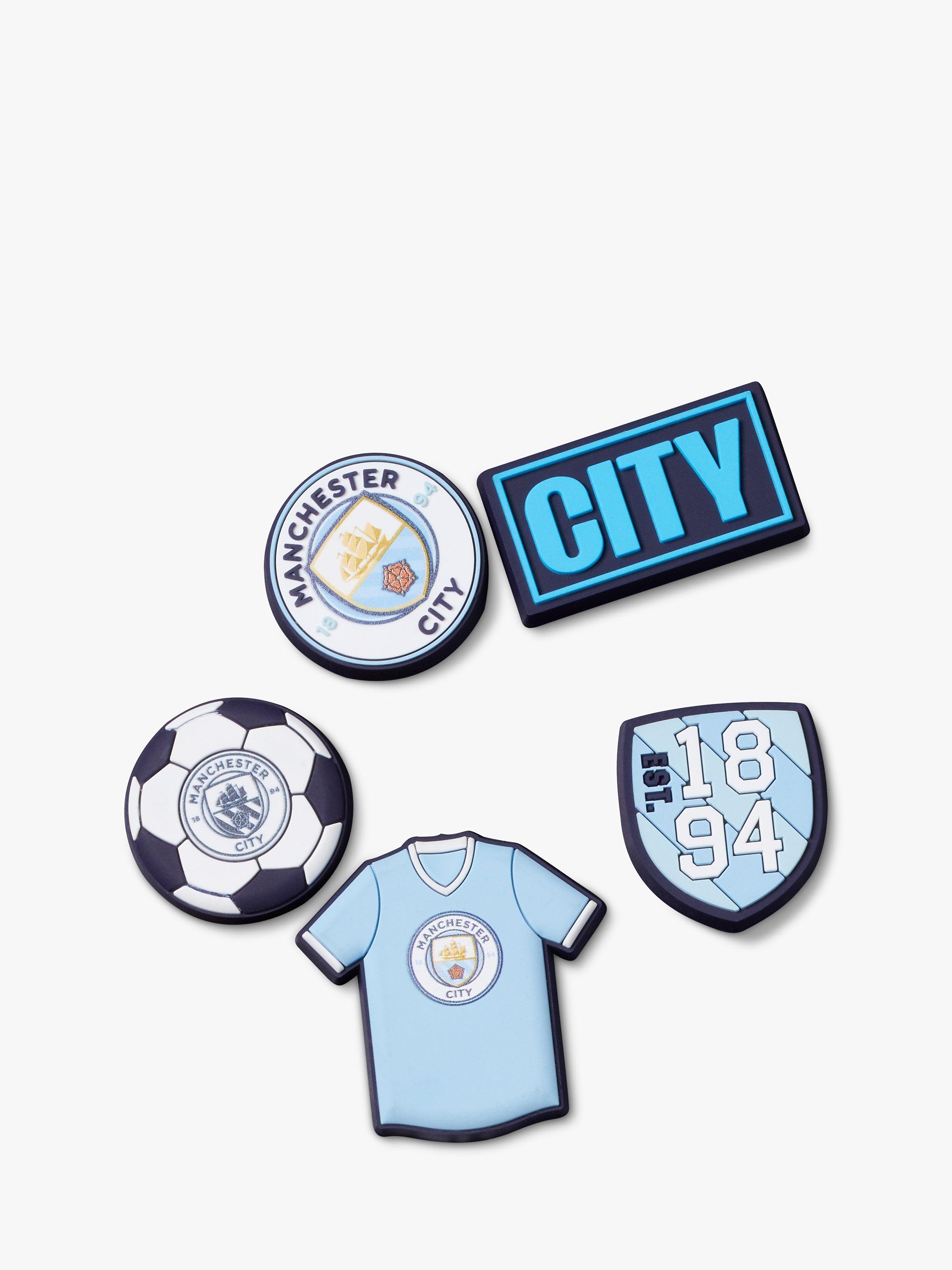 Product image 1 of 3, which shows Crocs Manchester City Jibbitz, Pack of 5, Multi