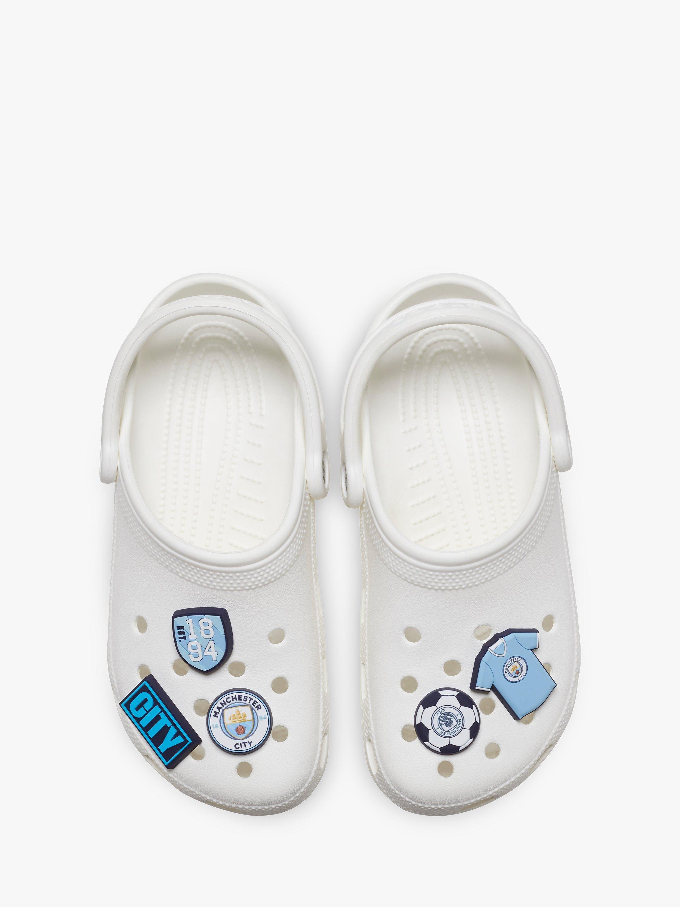 Product image 2 of 3, which shows Crocs Manchester City Jibbitz, Pack of 5, Multi