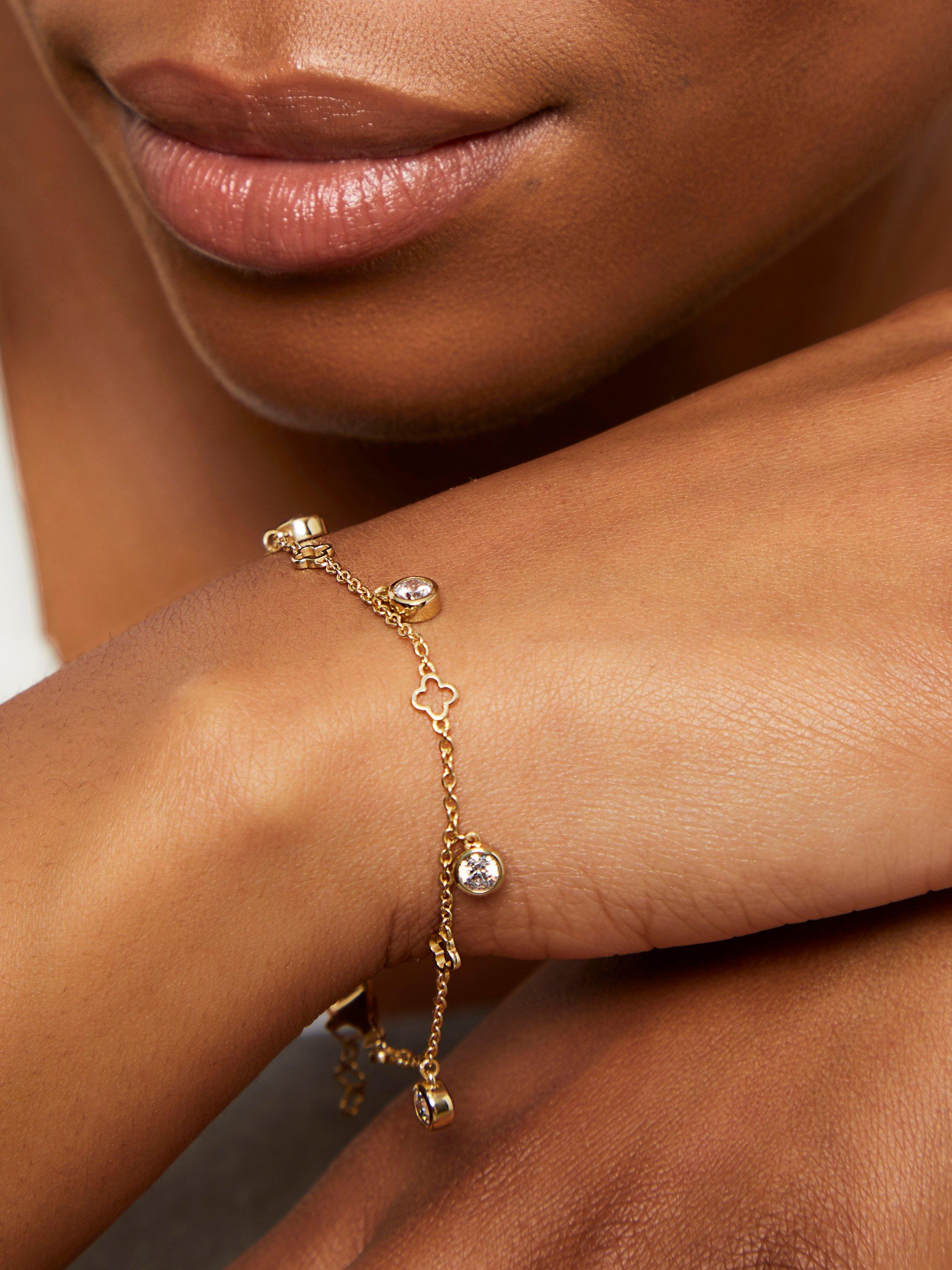 Product image 2 of 5, which shows Jools by Jenny Brown Clover and Cubic Zirconia 5 Charm Bracelet, Gold