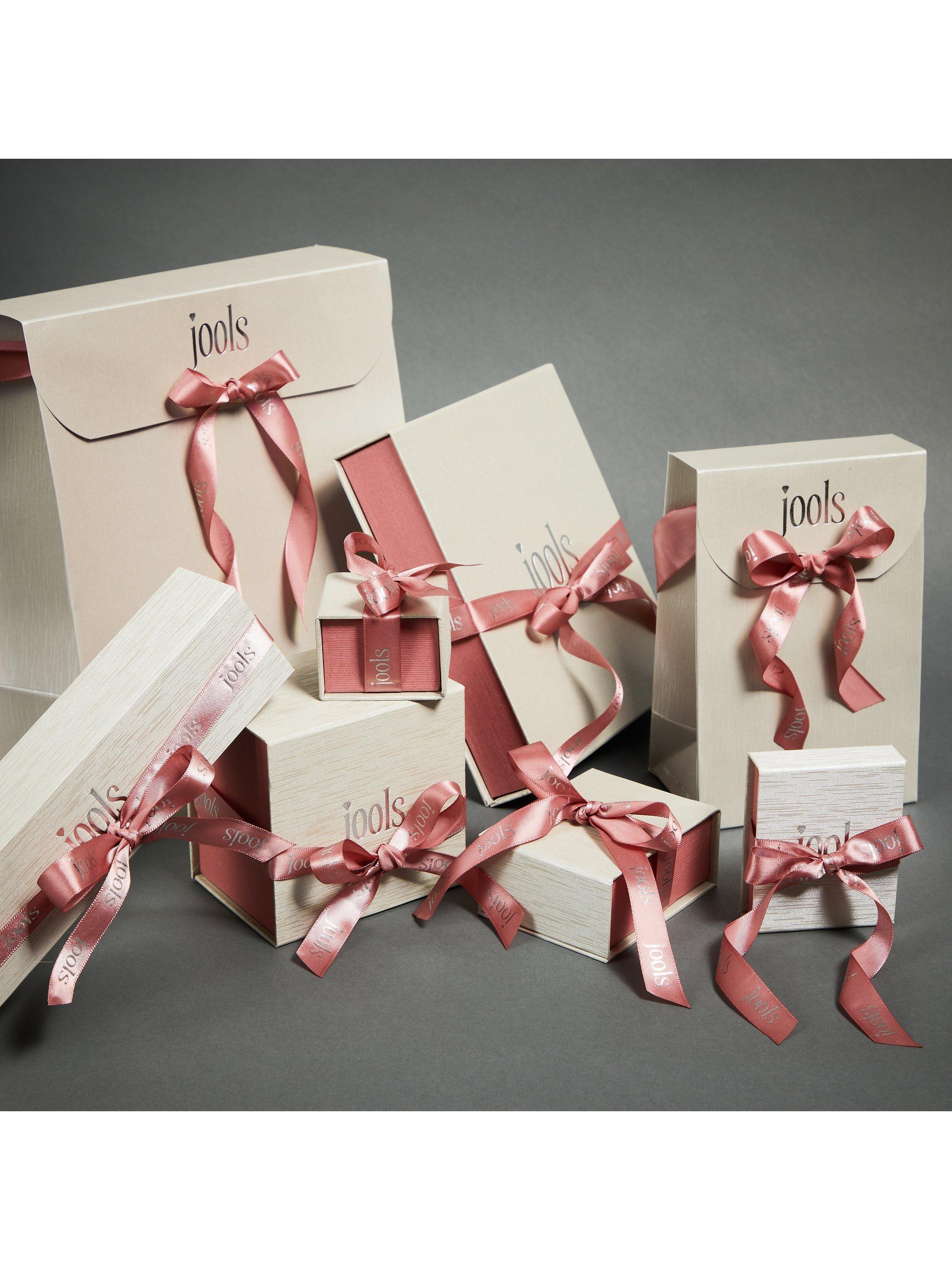 Product image 4 of 4, which shows Jools by Jenny Brown Cubic Zirconia Twist Huggie Earrings, Silver