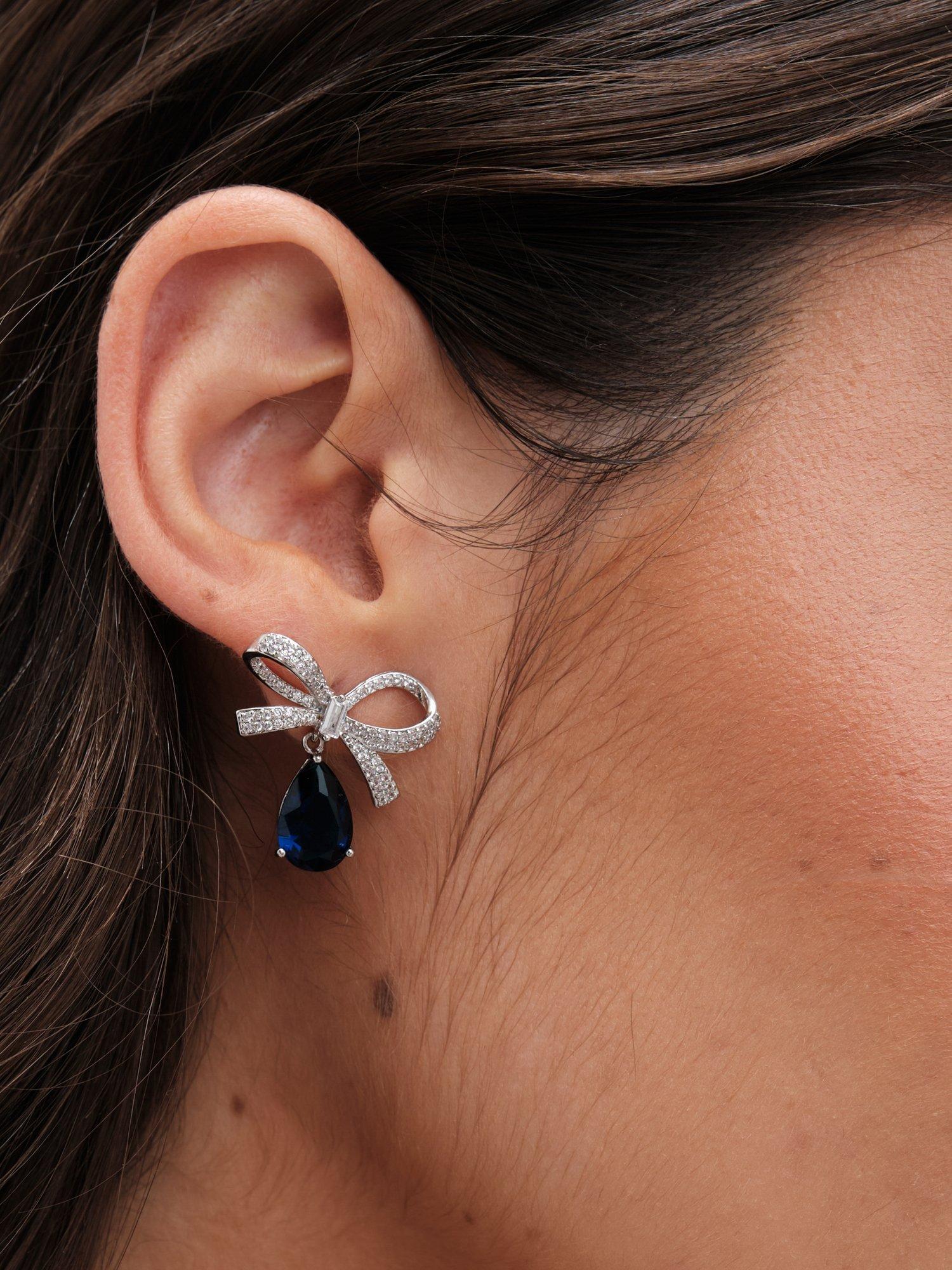Product image 3 of 4, which shows Jon Richard Cubic Zirconia Bow & Blue Peardrop Earrings, Silver