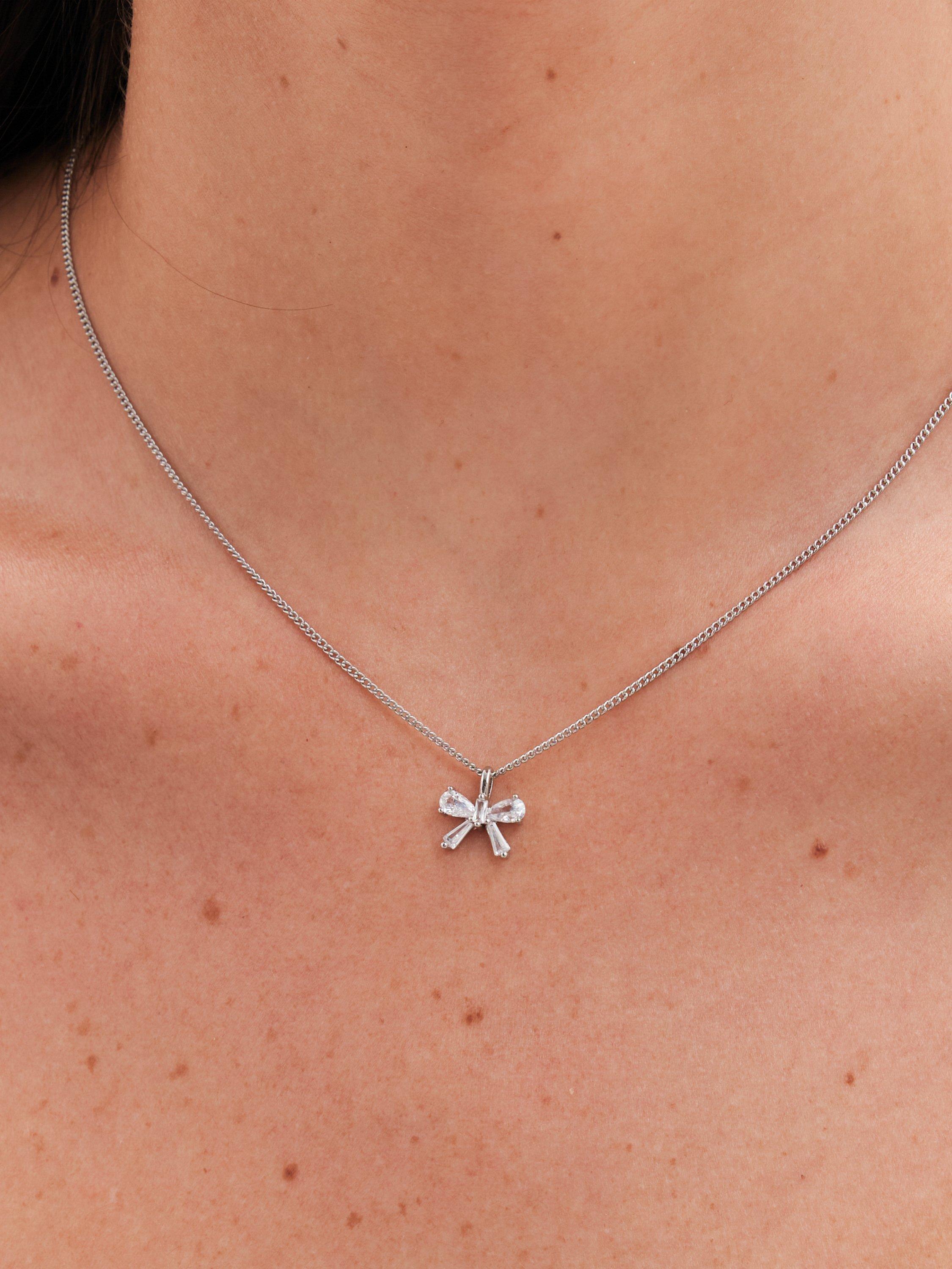 Product image 3 of 3, which shows Jon Richard Bow Pendant Necklace and Stud Earrings Set, Silver
