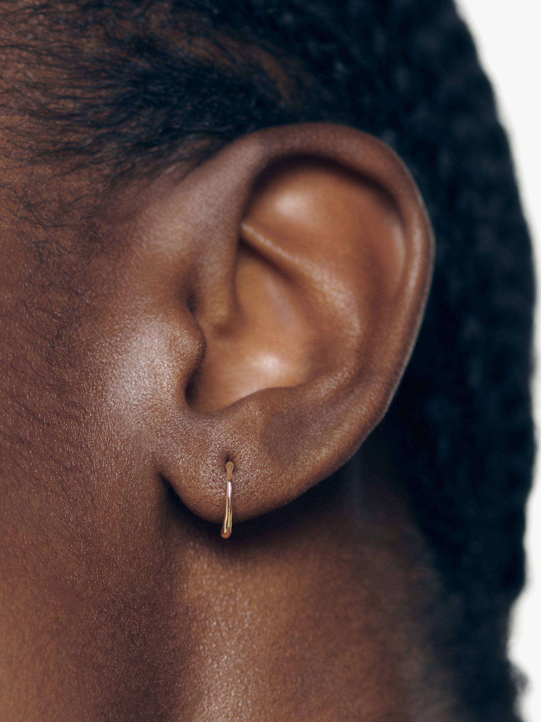 Product image 3 of 4, which shows Monica Vinader Siren Mini Huggie Earrings