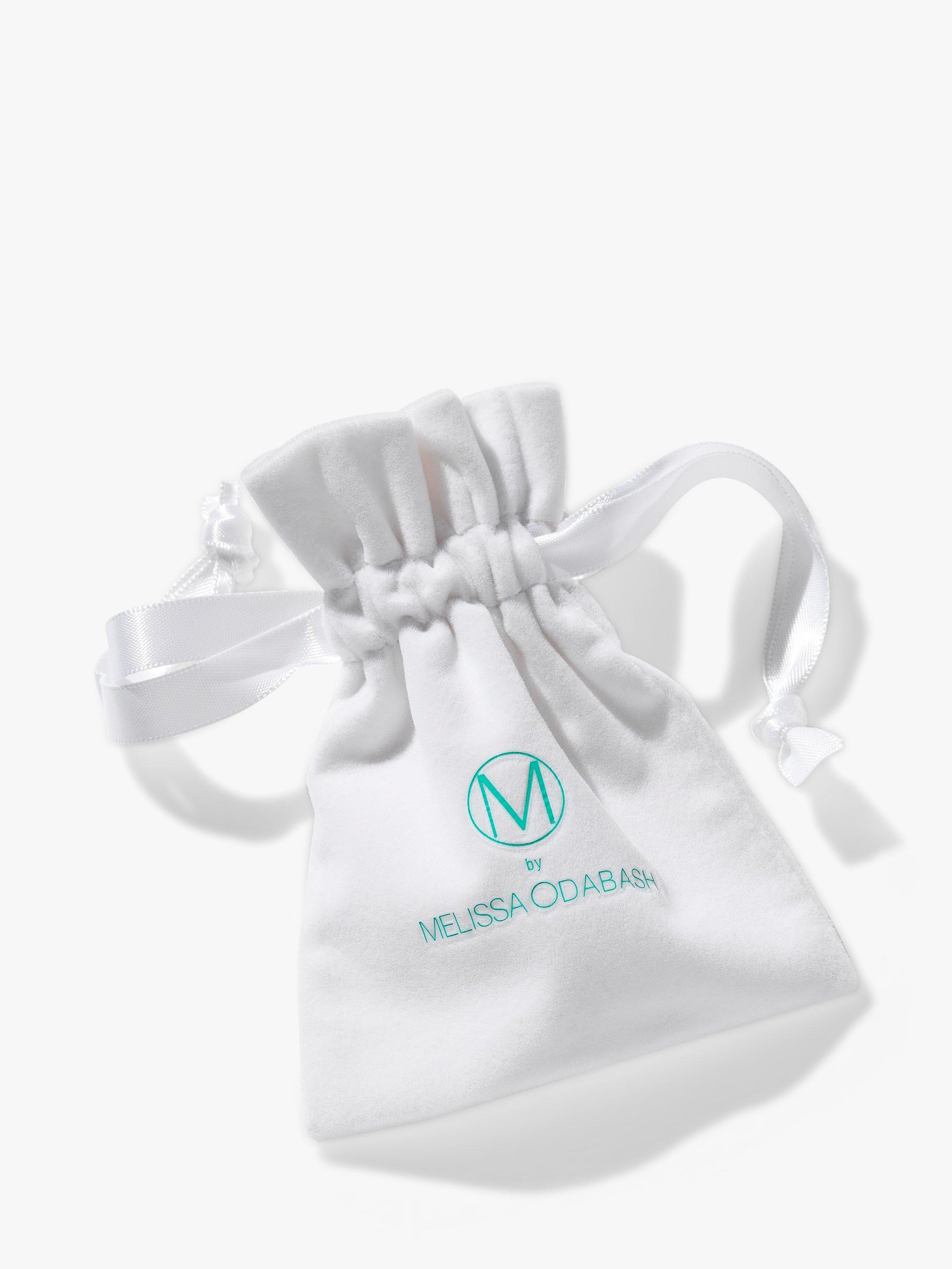 Product image 2 of 3, which shows Melissa Odabash Graduated Crystal Huggie Hoop Earrings, Gold